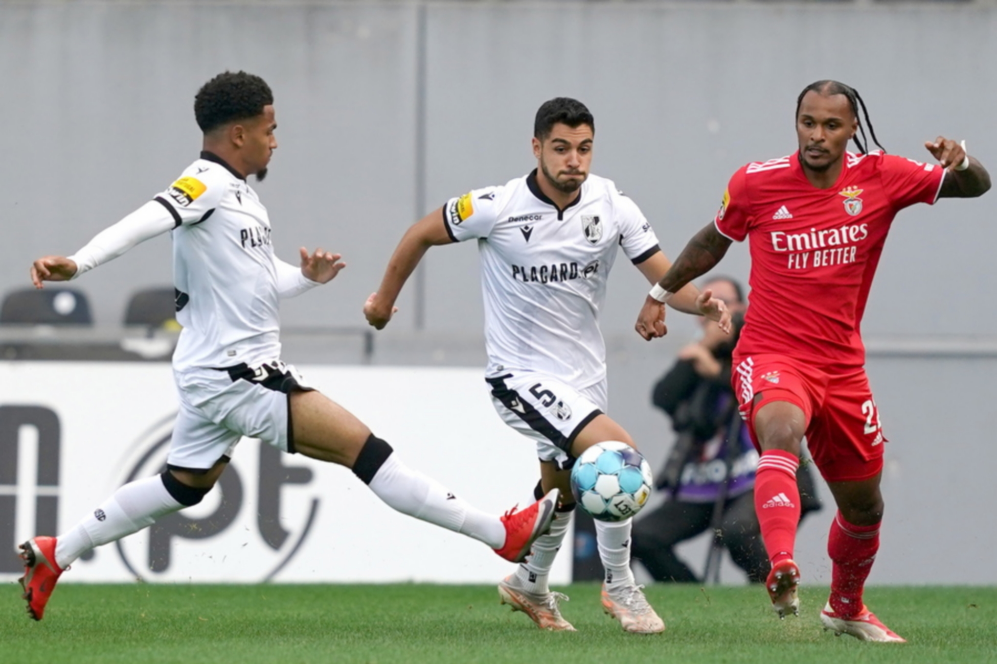 epa09488007 Vitoria de Guimaraes's Rafa Soares (L) in action against Benfica's Valentino Lazaro (R) during the Portuguese First League soccer match between Vitoria de Guimaraes and Benfica held at D. Afonso Henriques stadium in Guimaraes, Portugal, 25 September 2021.  EPA