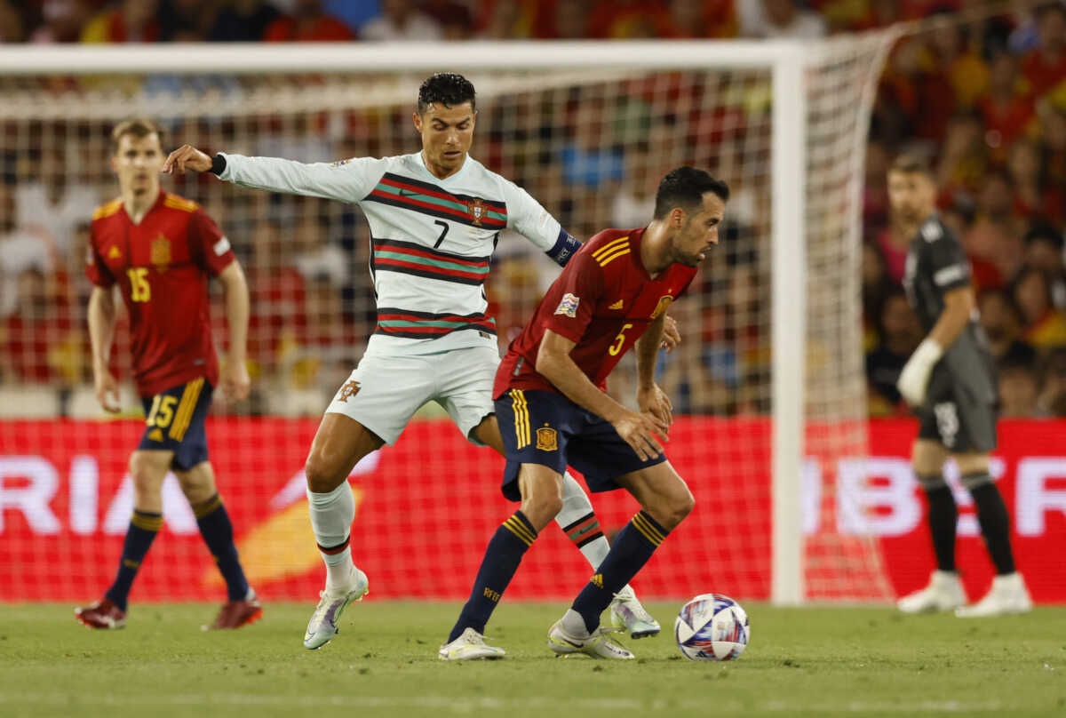 Soccer Football - UEFA Nations League - Group B - Spain v Portugal - Estadio Benito Villamarin, Seville, Spain - June 2, 2022 Portugal's Cristiano Ronaldo in action with Spain's Sergio Busquets REUTERS