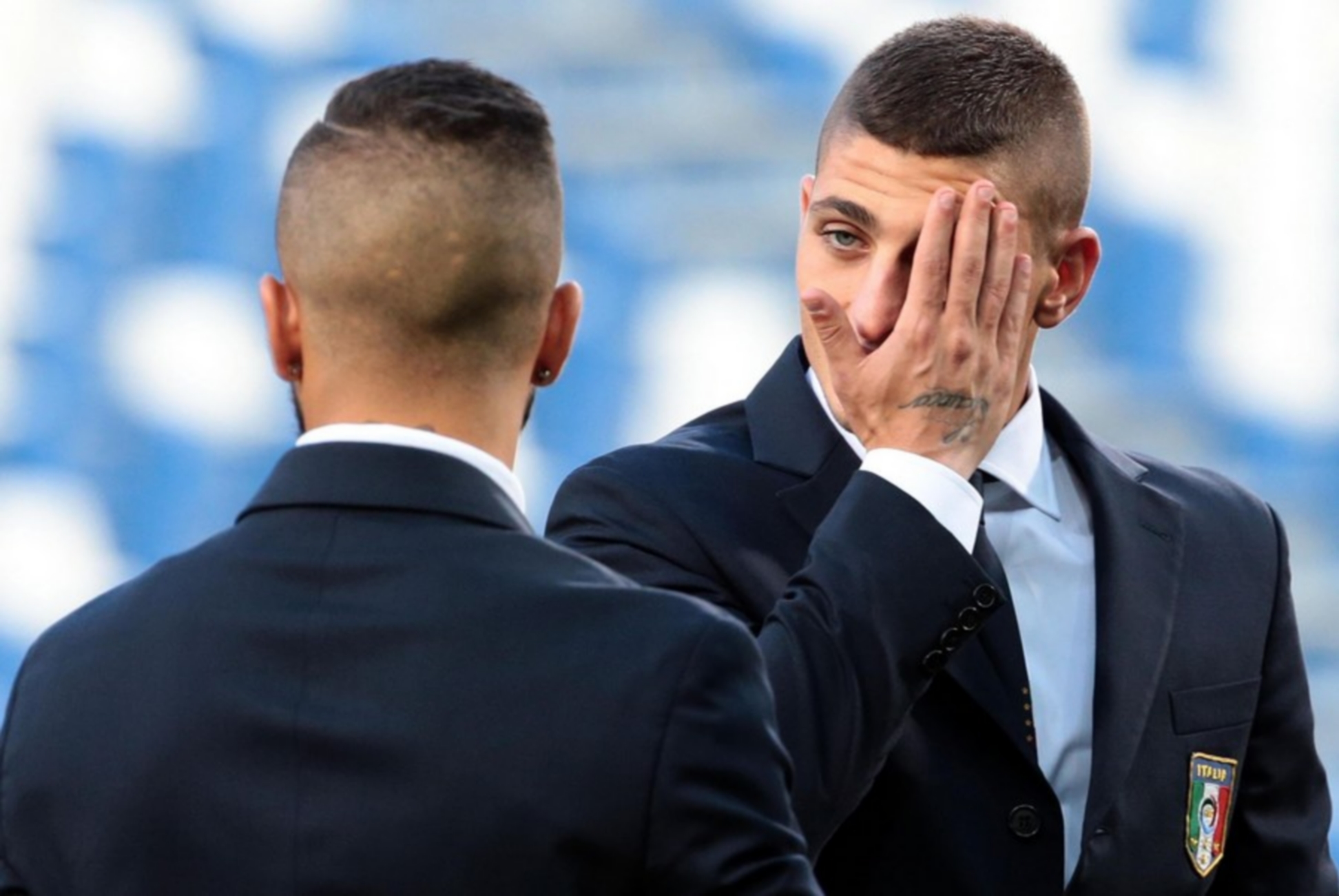 epa06183688 Italy's players Marco Veratti (R) and Lorenzo Insigne react during a pitch inspection at the Mapei Stadium in Reggio Emilia, Italy, 04 September 2017. Italy will face Israel in their FIFA World Cup 2018 qualifying soccer match on 05 September 2017.  EPA