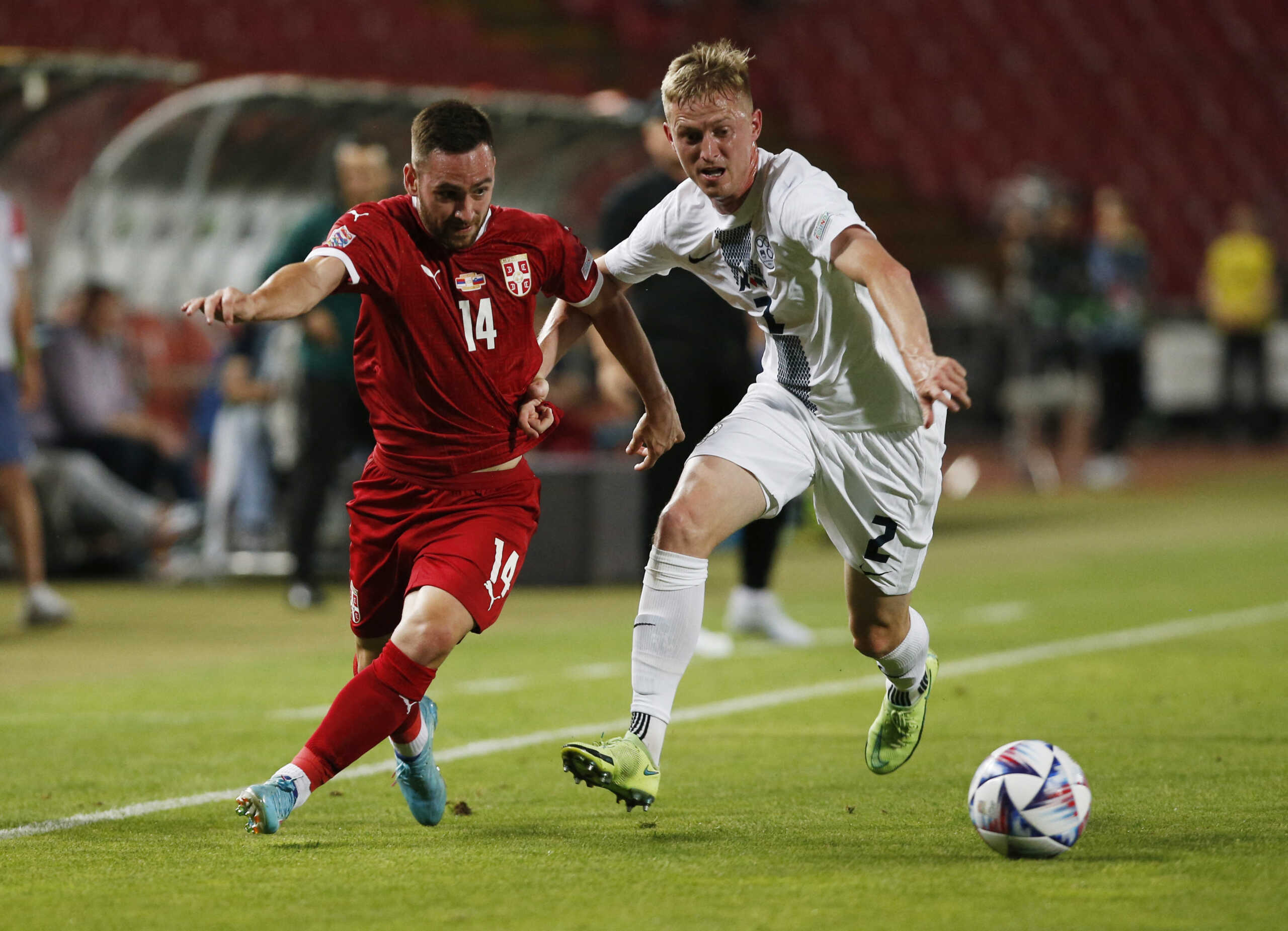 Soccer Football - UEFA Nations League - Group H - Serbia v Slovenia - Rajko Mitic Stadium, Belgrade, Serbia - June 5, 2022 Serbia's Andrija Zivkovic in action with Slovenia's Zan Karnicnik REUTERS