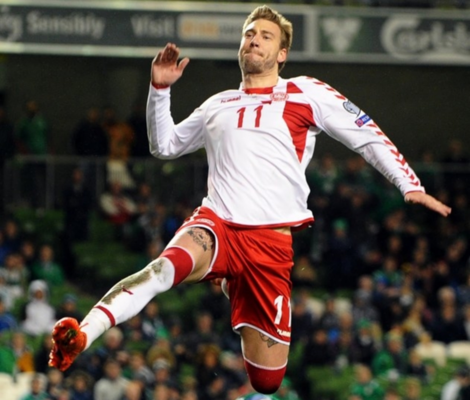 epaselect epa06329769 Denmark's Nicklas Bendtner celebrates after scoring the 5-1 lead from the penalty spot during the FIFA World Cup 2018 qualification playoff, second leg soccer match between Ireland and Denmark in Dublin, Ireland, 14 November 2017. Denmark won 5-1 on aggregate.  EPA