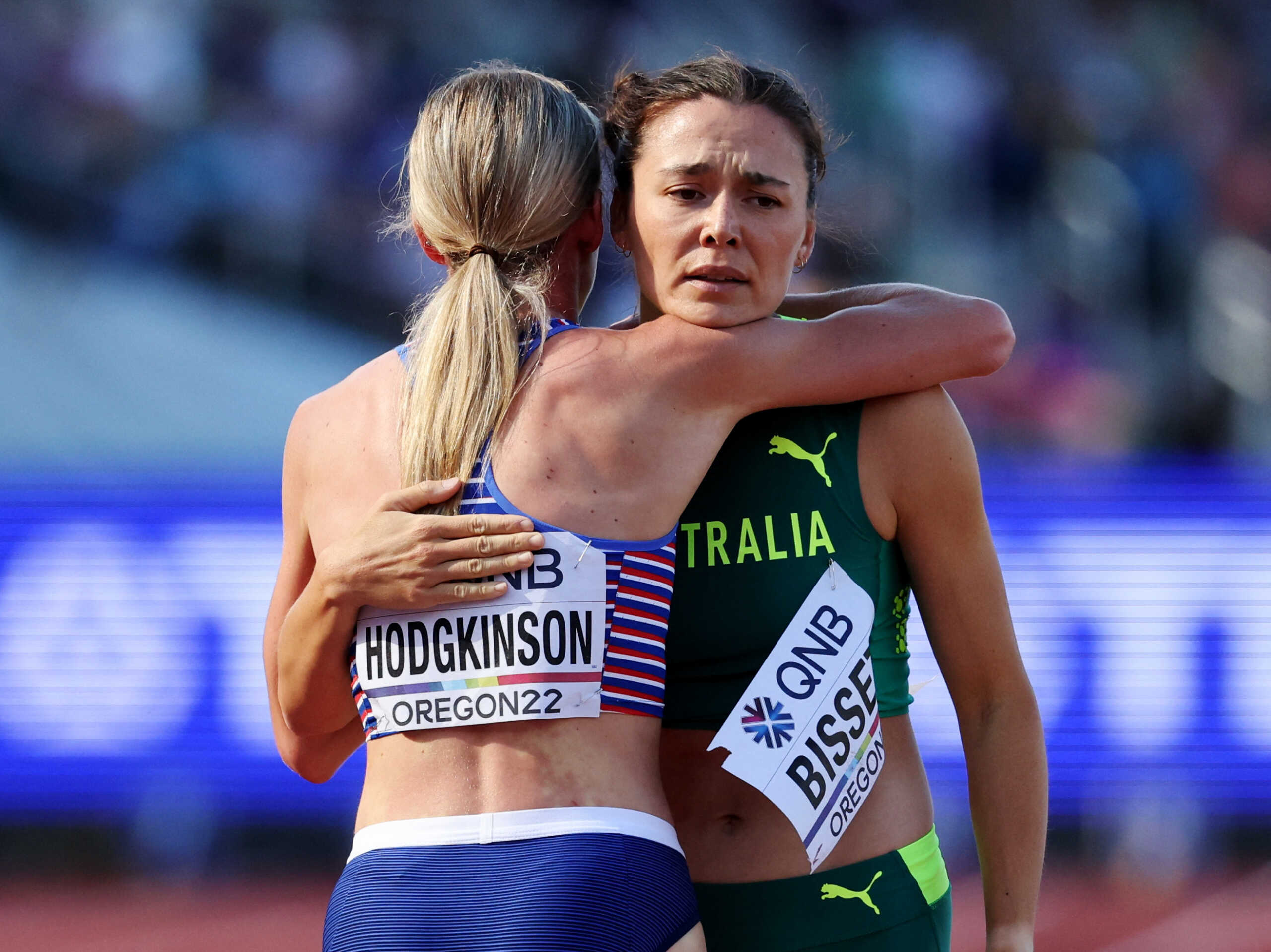 Athletics - World Athletics Championships - Women's 800 Metres - Heats - Hayward Field, Eugene, Oregon, U.S. - July 21, 2022 Britain's Keely Hodgkinson celebrates after winning the heat with seventh placed Australia's Catriona Bisset REUTERS