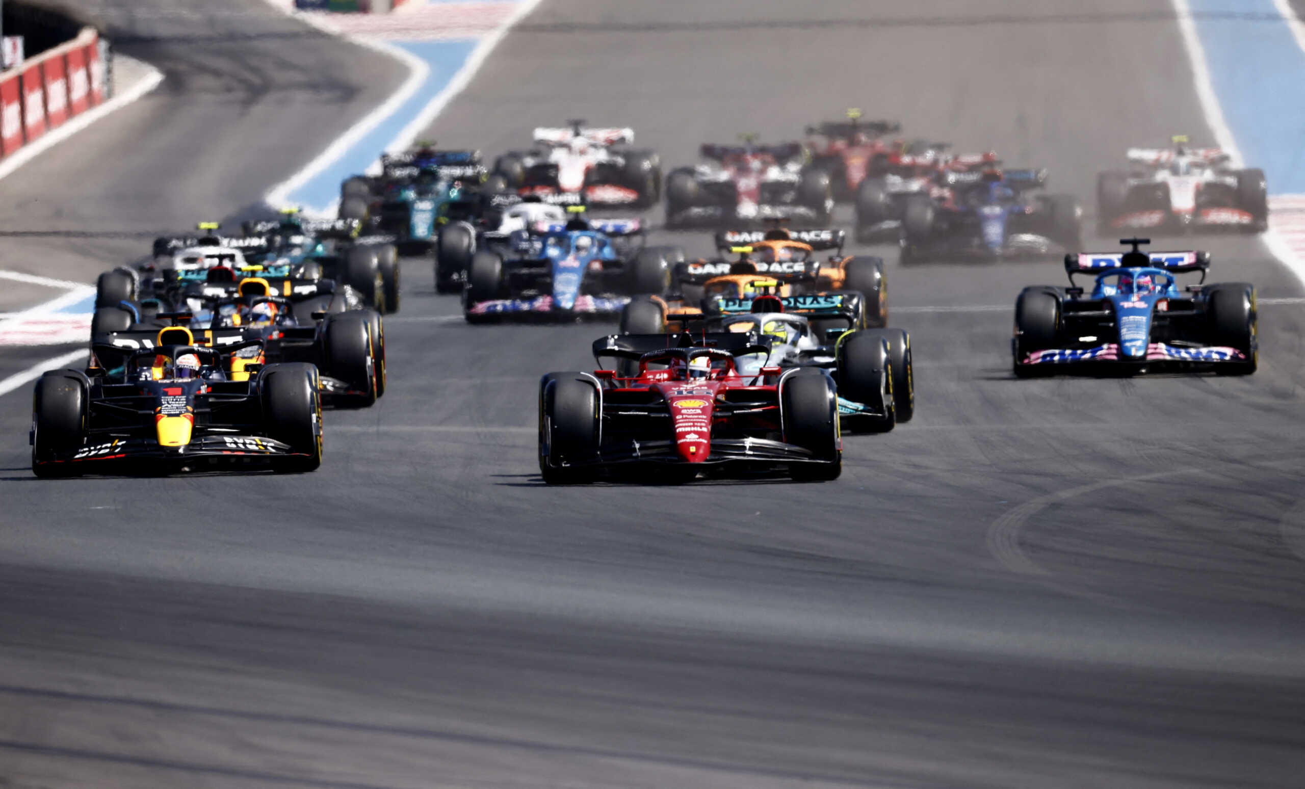 Formula One F1 - French Grand Prix - Circuit Paul Ricard, Le Castellet, France - July 24, 2022 Ferrari's Charles Leclerc and Red Bull's Max Verstappen at the start of the race REUTERS