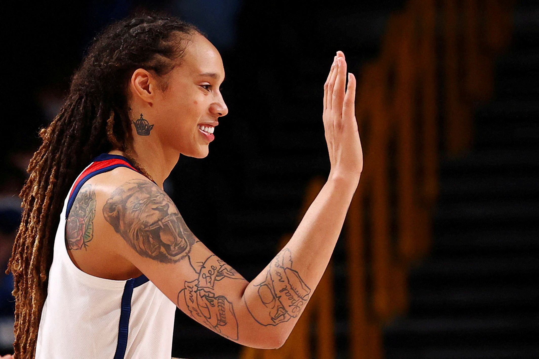 FILE PHOTO: Brittney Griner of the United States congratulates a team mate during their Women's Basketball Gold Medal game against Japan at the Tokyo 2020 Summer Olympics at the Saitama Super Arena in Saitama, Japan, August 8, 2021.  Picture taken August 8, 2021.   REUTERS