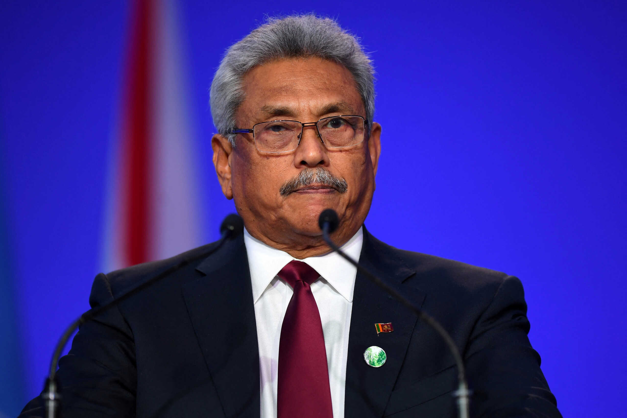 FILE PHOTO: Sri Lanka's President Gotabaya Rajapaksa presents his national statement as a part of the World Leaders' Summit at the UN Climate Change Conference (COP26) in Glasgow, Scotland, Britain November 1, 2021. Andy Buchanan
