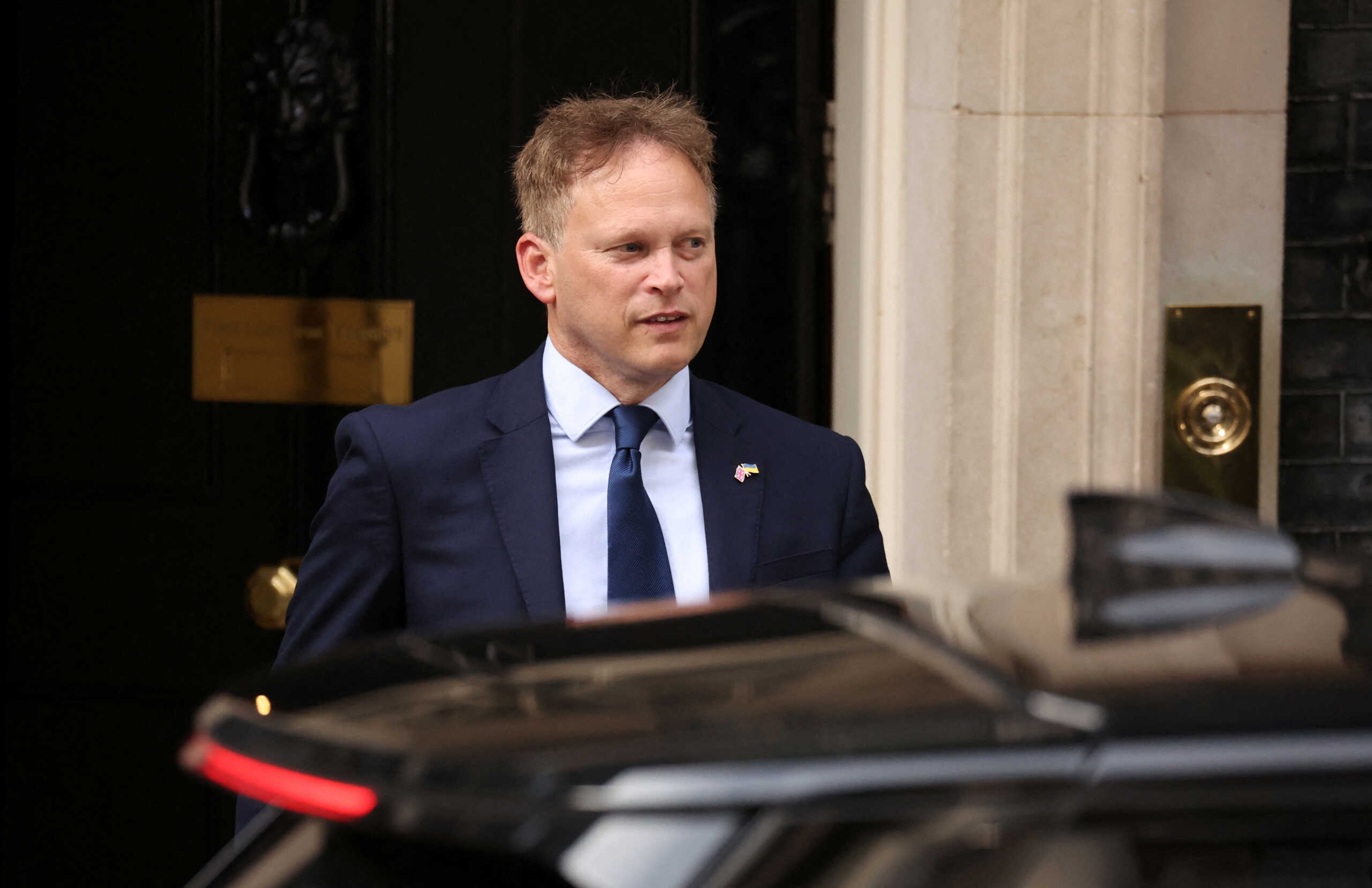 British Transport Secretary Grant Shapps leaves 10 Downing Street, in London, Britain July 6, 2022. REUTERS