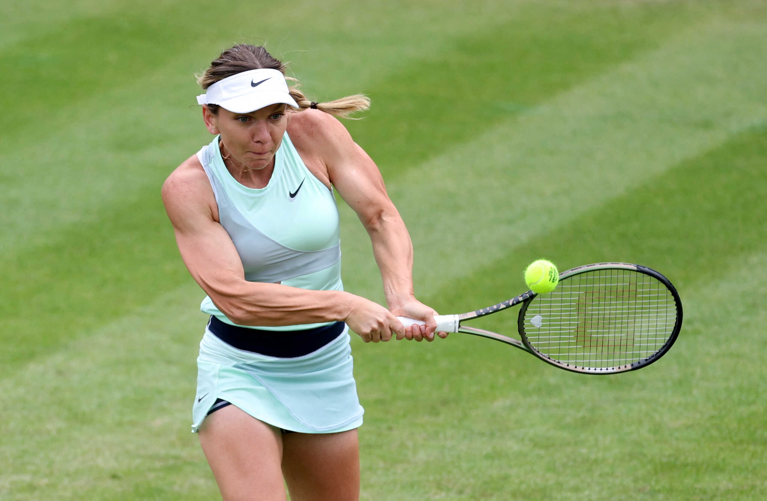 Tennis - WTA 250 - Birmingham Classic - Edgbaston Priory Club, Edgbaston, Birmingham, Britain - June 13, 2022 Romania's Simona Halep in action during her first round match against Ukraine's Lesia Tsurenko Action Images via Reuters