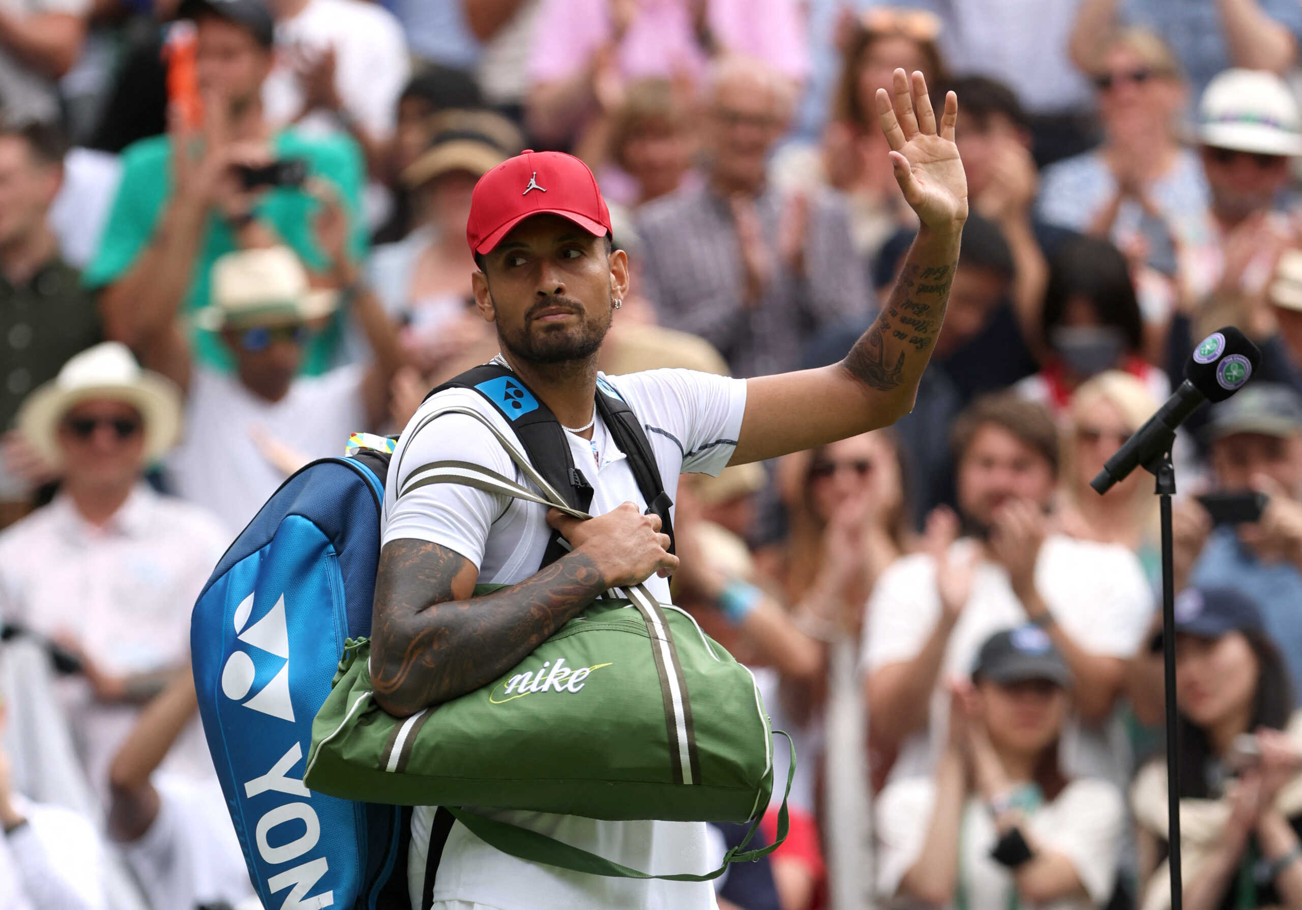 Tennis - Wimbledon - All England Lawn Tennis and Croquet Club, London, Britain - July 4, 2022  Australia's Nick Kyrgios celebrates after winning his fourth round match against Brandon Nakashima of the U.S. REUTERS