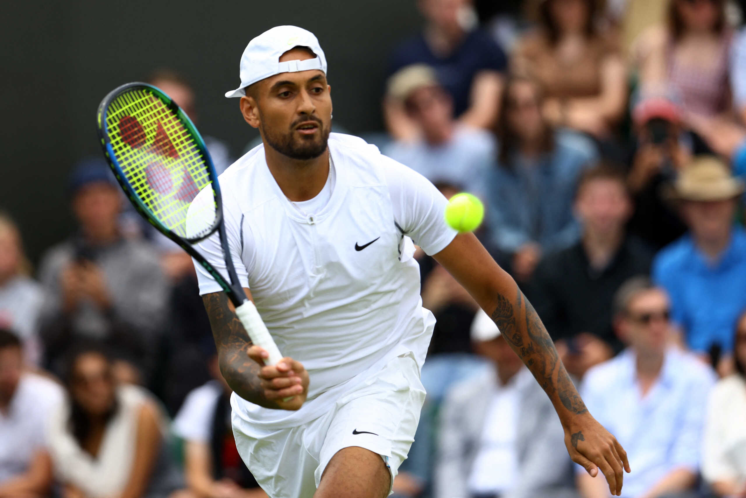 Tennis - Wimbledon - All England Lawn Tennis and Croquet Club, London, Britain - June 28, 2022 Australia's Nick Kyrgios in action during his first round match against Britain's Paul Jubb REUTERS