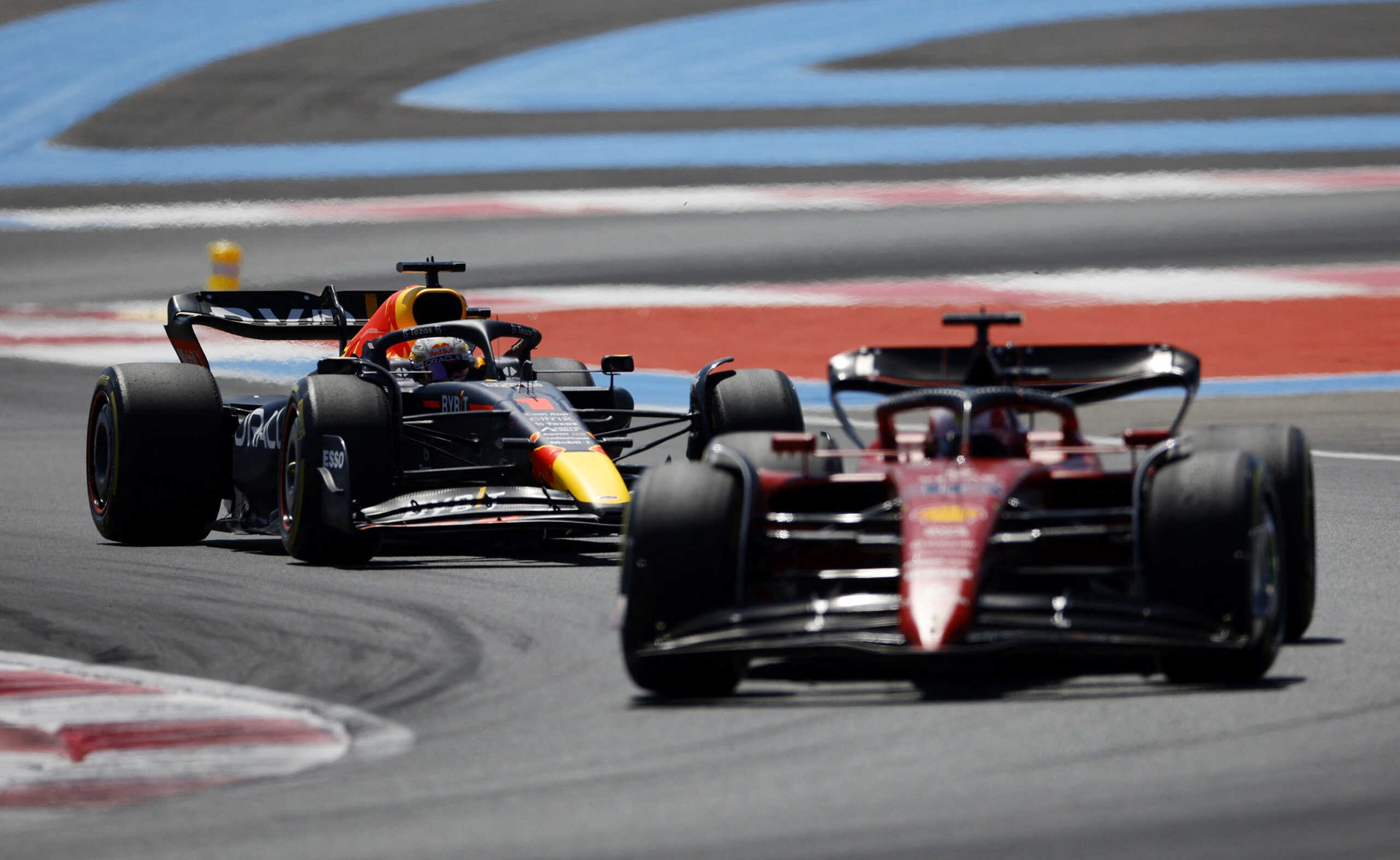 Formula One F1 - French Grand Prix - Circuit Paul Ricard, Le Castellet, France - July 24, 2022 Ferrari's Charles Leclerc and Red Bull's Max Verstappen in action during the race REUTERS