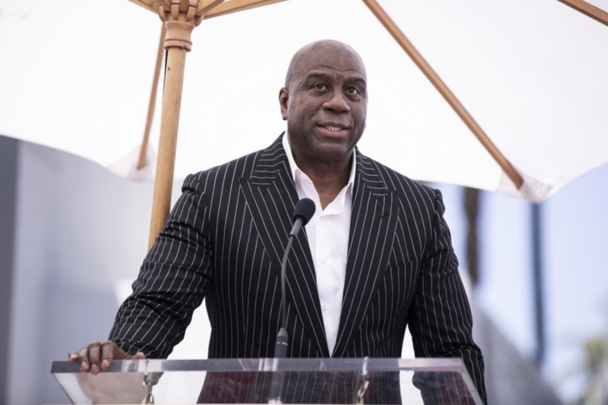 epa09927248 Former professional basketball player Earvin 'Magic' Johnson delivers a speech during a ceremony honoring Judge Greg Mathis with the 2,722nd star on the Hollywood Walk of Fame in the Category of Television in Hollywood, California, USA, 04 May 2022.  EPA