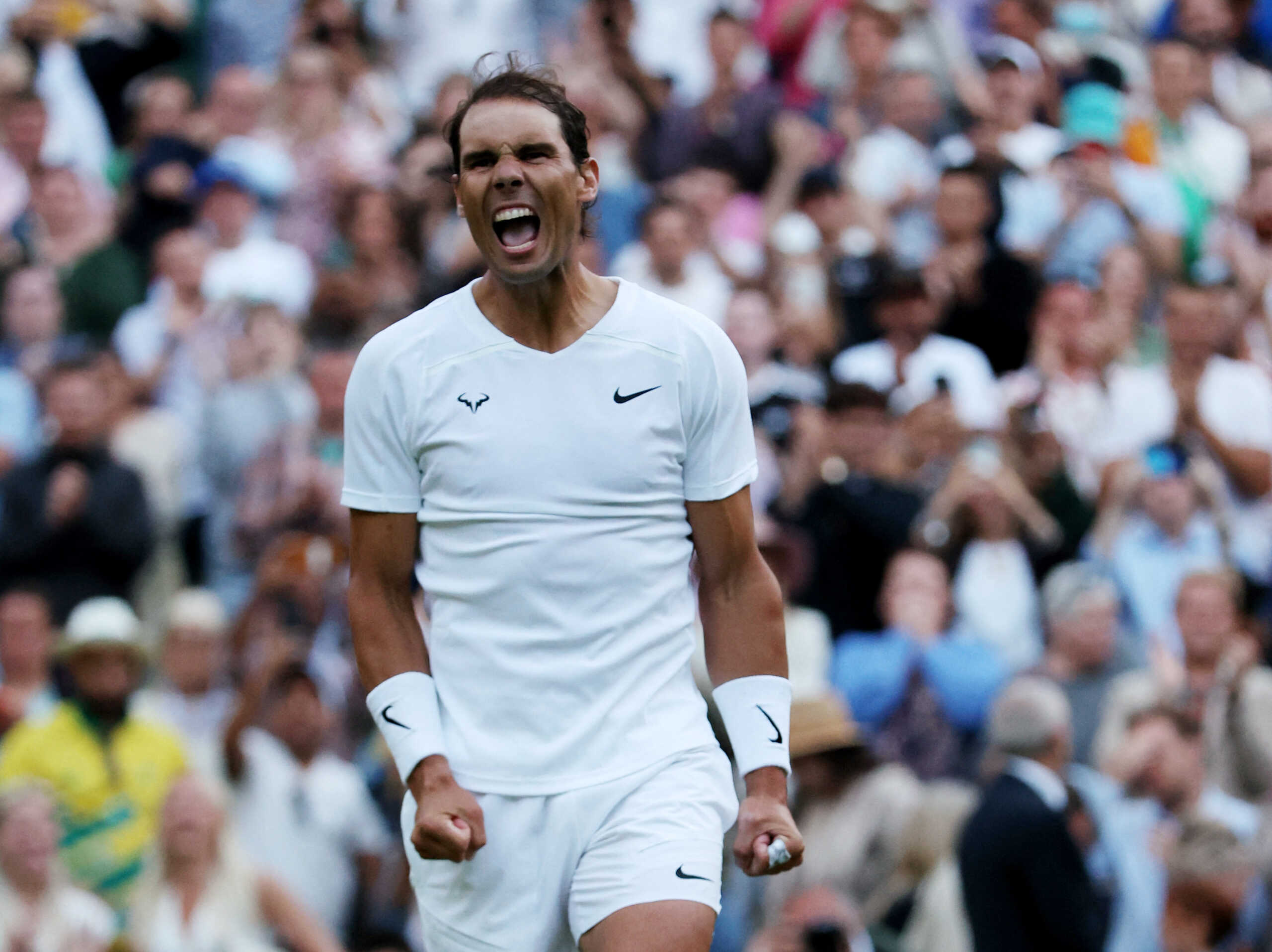 Tennis - Wimbledon - All England Lawn Tennis and Croquet Club, London, Britain - July 4, 2022  Spain's Rafael Nadal celebrates winning his fourth round match against Netherlands' Botic van de Zandschulp REUTERS
