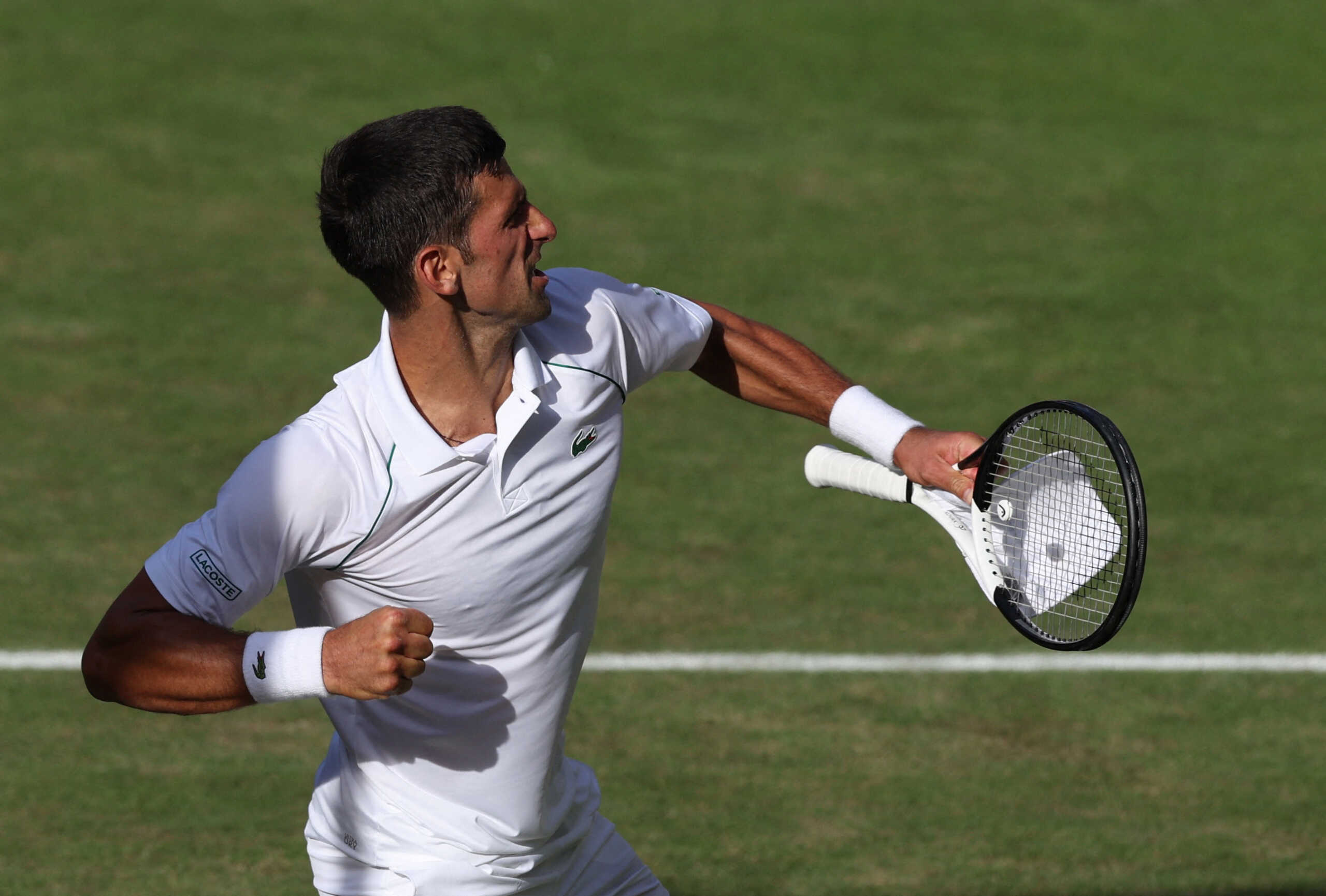 Tennis - Wimbledon - All England Lawn Tennis and Croquet Club, London, Britain - July 8, 2022  Serbia's Novak Djokovic celebrates winning his semi final match against Britain's Cameron Norrie REUTERS