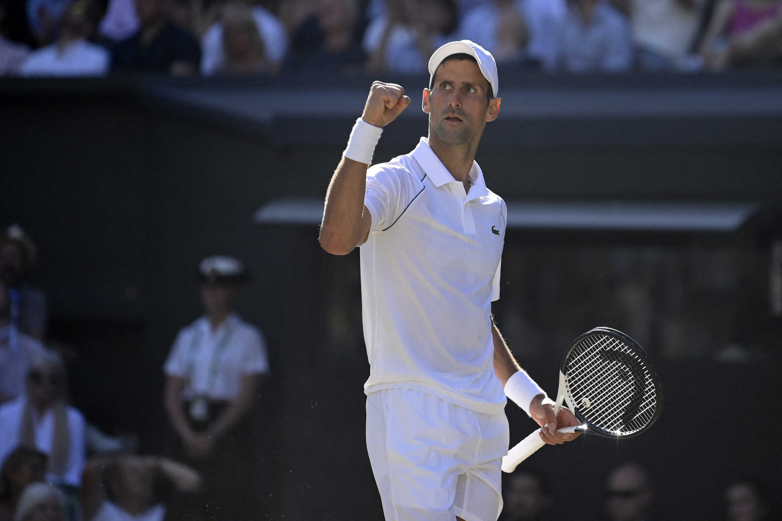 Tennis - Wimbledon - All England Lawn Tennis and Croquet Club, London, Britain - July 8, 2022  Serbia's Novak Djokovic reacts during his semi final match against Britain's Cameron Norrie REUTERS
