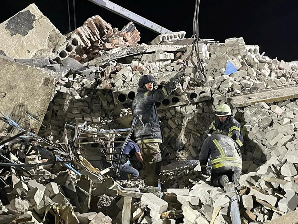 Rescue operation is underway after a missile strike, amid Russia's invasion of Ukraine, at a location given as Chasiv Yar, Ukraine, in this handout image released July 10, 2022. Donetsk region governor Pavlo Kyrylenko