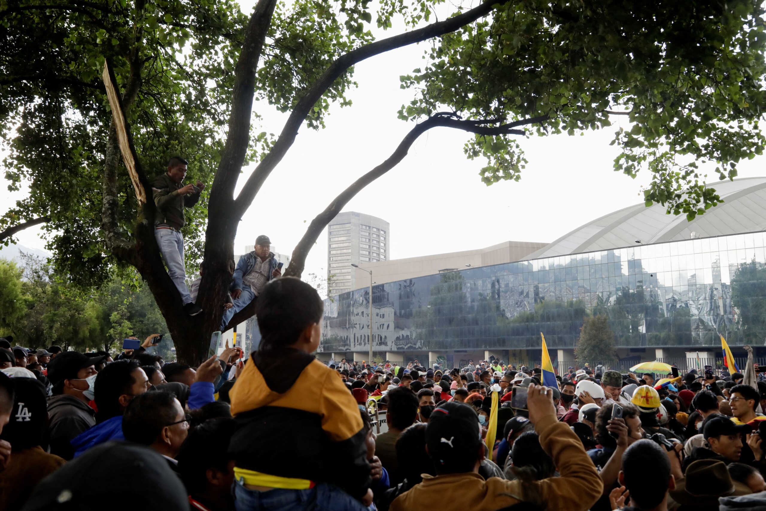 People celebrate after an agreement between indigenous organizations and Ecuador's government was signed, in Quito, Ecuador June 30, 2022. REUTERS