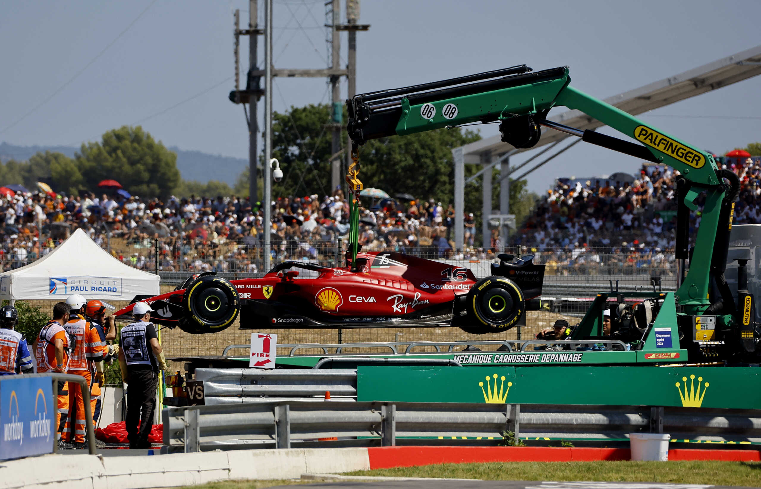 Formula One F1 - French Grand Prix - Circuit Paul Ricard, Le Castellet, France - July 24, 2022 Ferrari's Charles Leclerc's car is seen being taken back to the pit after crashing out of the race REUTERS