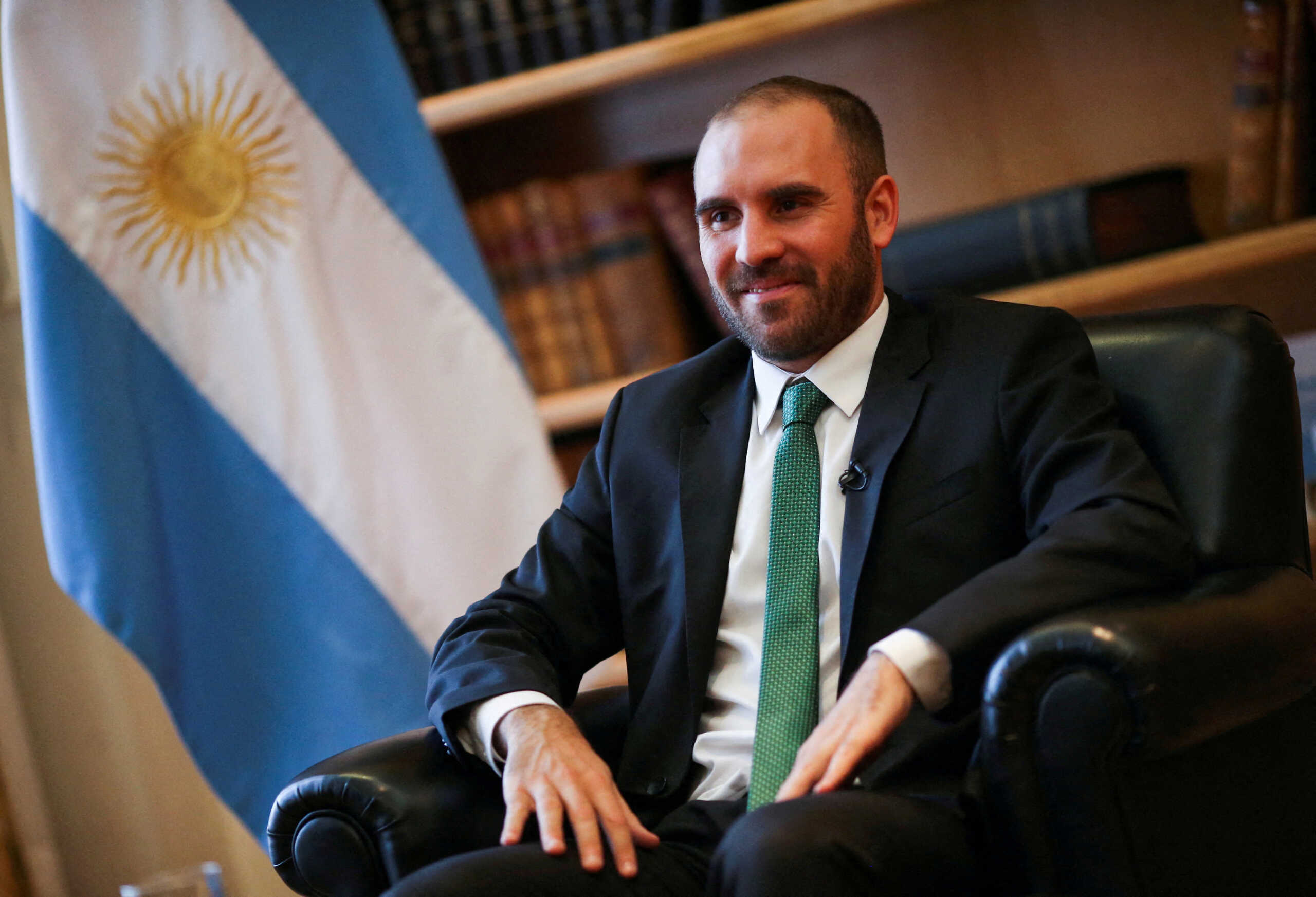 FILE PHOTO: Argentina's Economy Minister Martin Guzman poses for a picture before an interview with Reuters at the Economy Ministry, in Buenos Aires, Argentina December 10, 2020. REUTERS