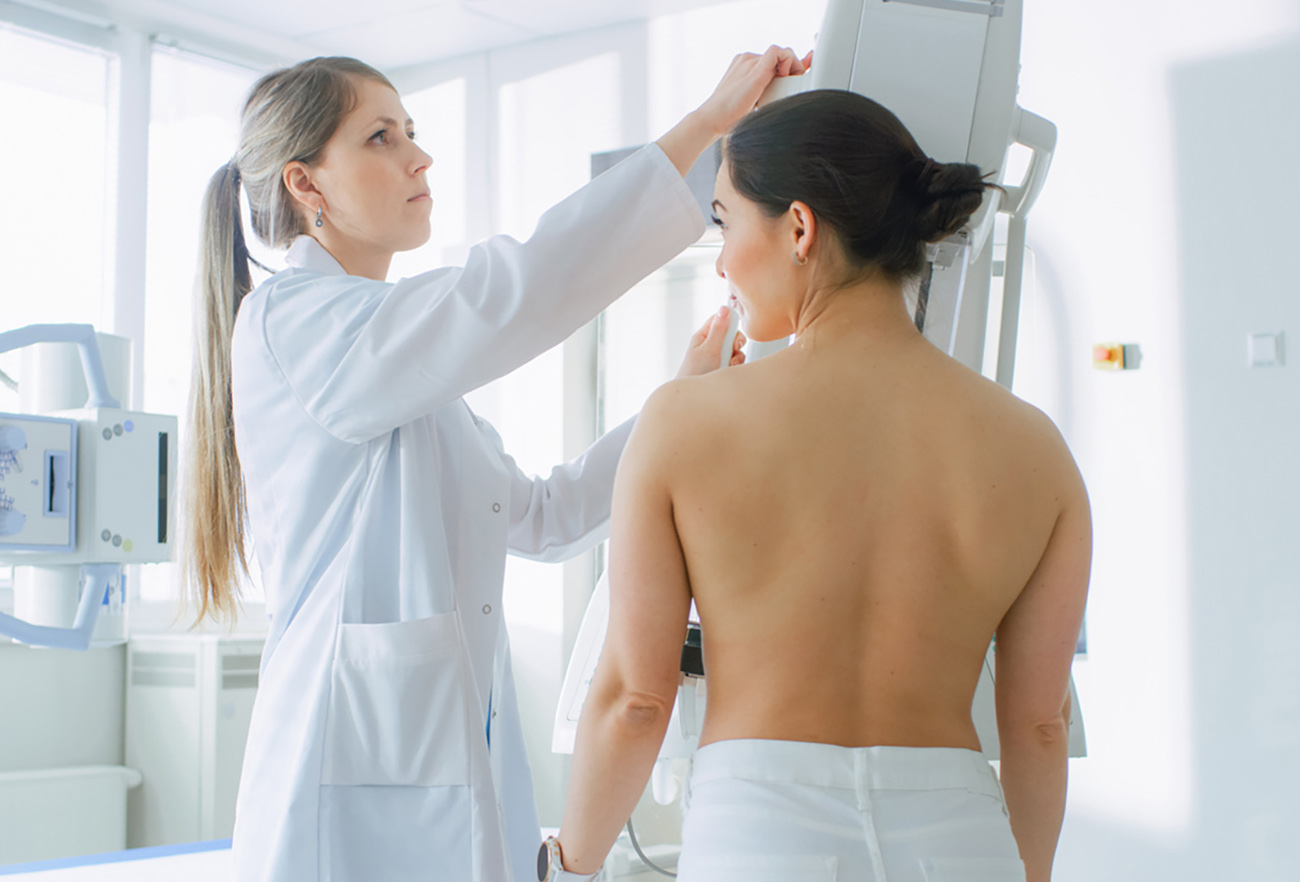 In the Hospital, Female Patients Undergoes Mammogram Screening Procedure Done by Mammography Technologist. Modern Technologically Advanced Clinic with Professional Doctors. Breast Cancer Prevention Screening.
