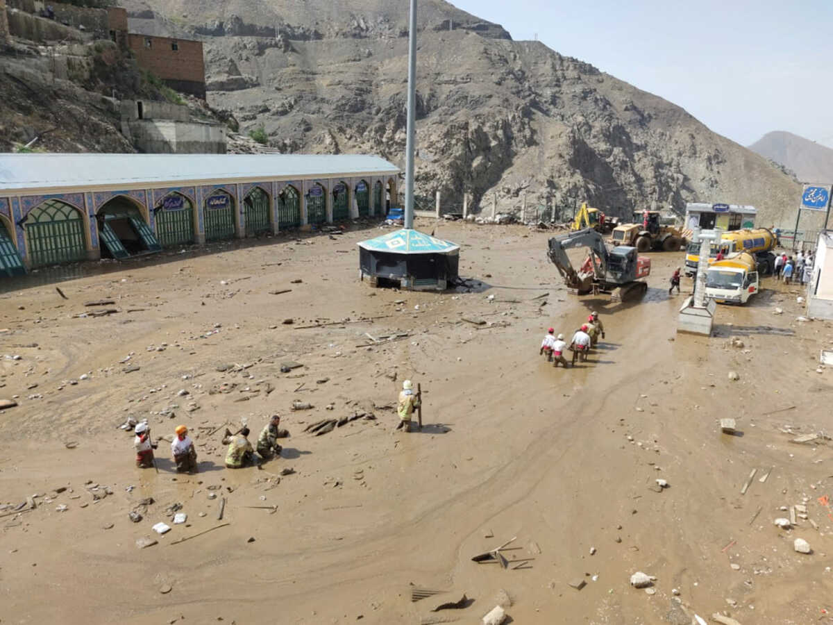 Rescuers work following the flood in Imamzadeh Davoud village in the north of Tehran, Iran July 28, 2022. Iranian Red Crescent Society