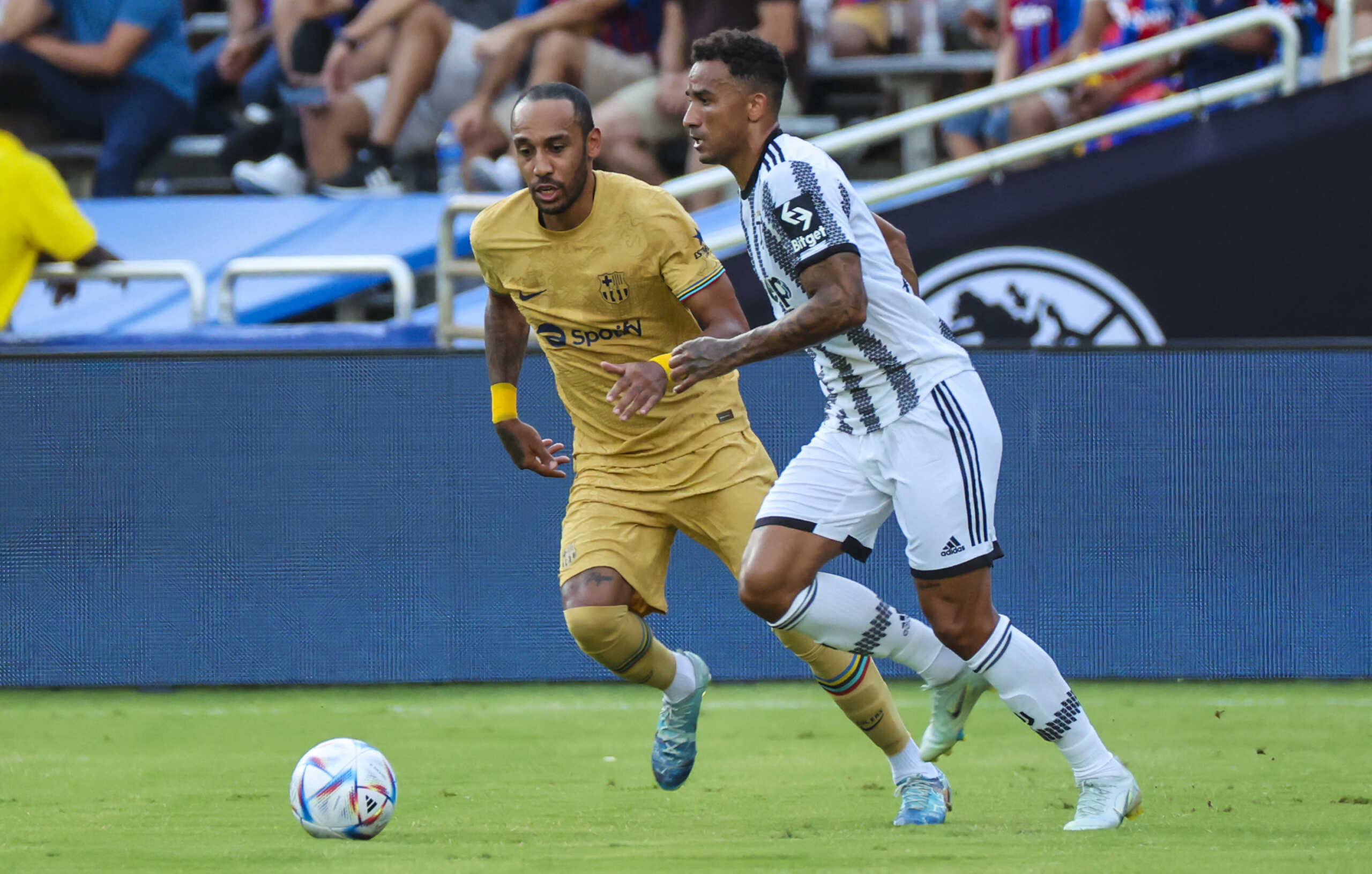 Jul 26, 2022; Dallas, Texas, USA;  Juventus defender Danilo (6) controls the ball as FC Barcelona forward Pierre-Emerick Aubameyang (17) defends during the first half at the Cotton Bowl. Mandatory Credit: Kevin Jairaj-USA TODAY Sports