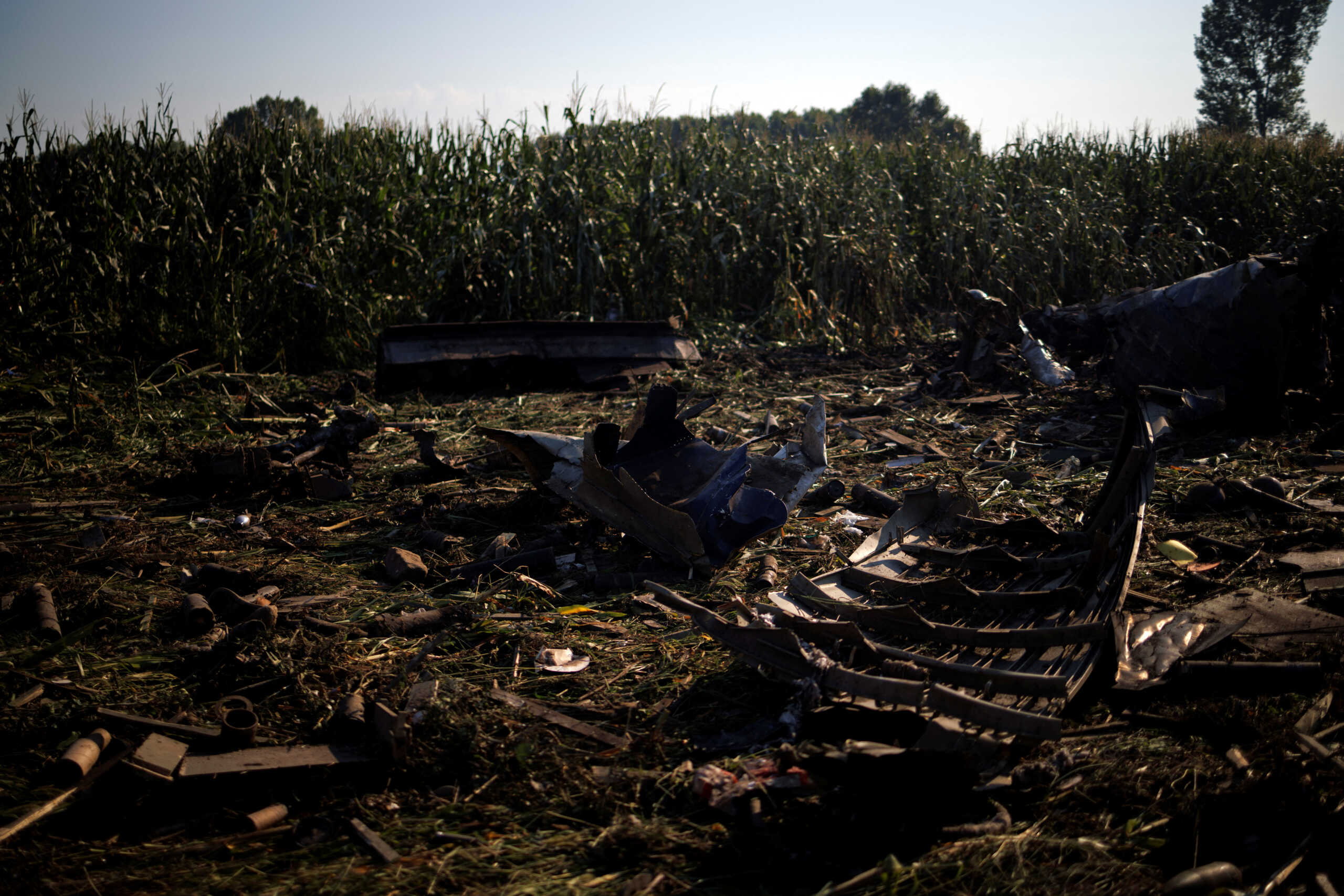 Debris is seen at the crash site of an Antonov An-12 cargo plane owned by a Ukrainian company, near Kavala, Greece, July 17, 2022. REUTERS