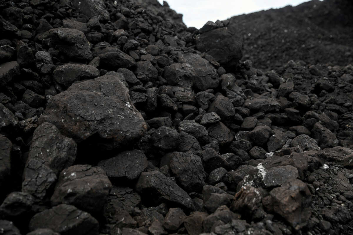 FILE PHOTO: Lignite is seen at a loading station near the open-pit mine field of Megalopolis, Greece June 9, 2022. REUTERS