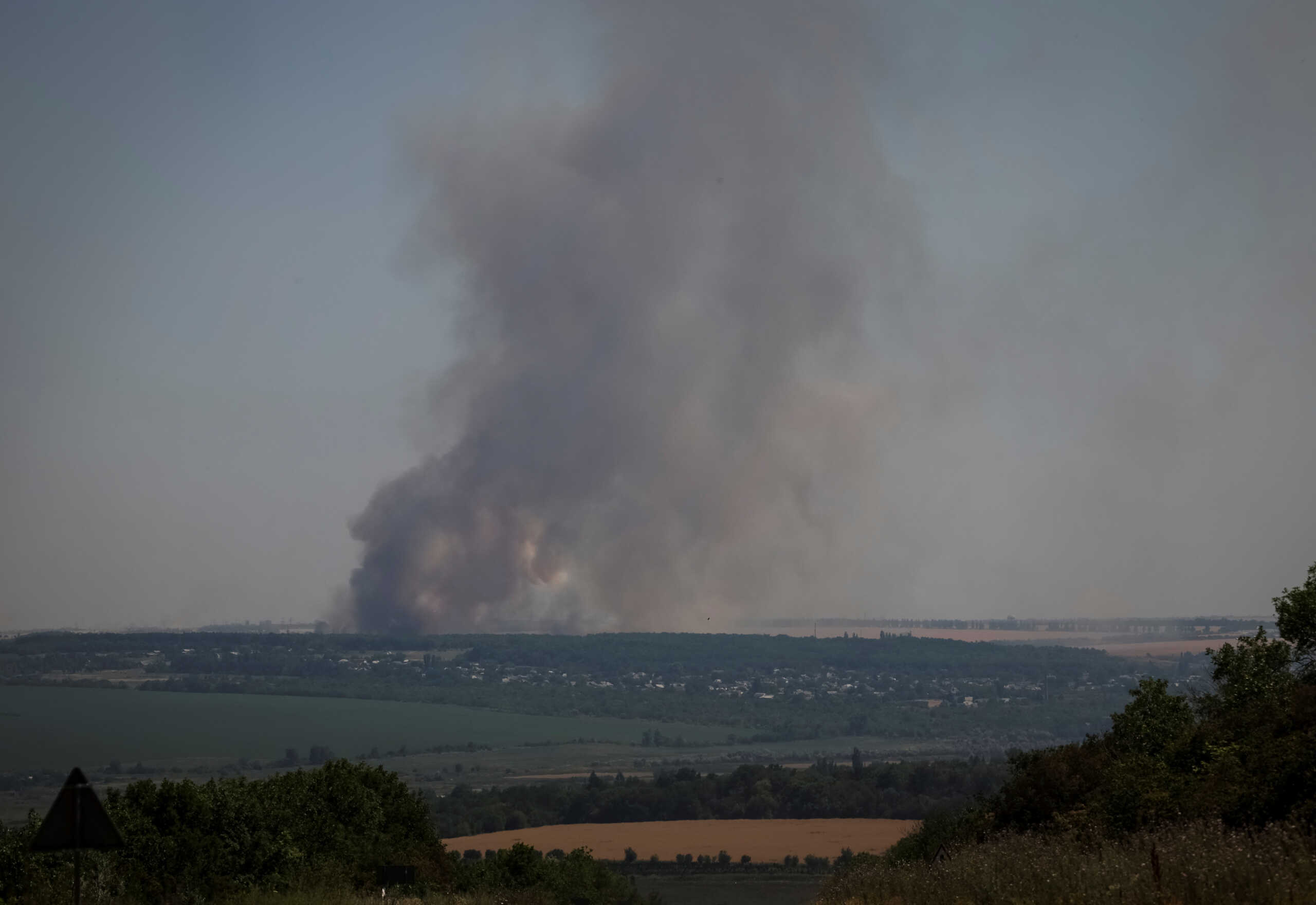 Smoke rises in the sky after shelling, amid Russia's attack, in Donetsk region, Ukraine July 7, 2022. REUTERS