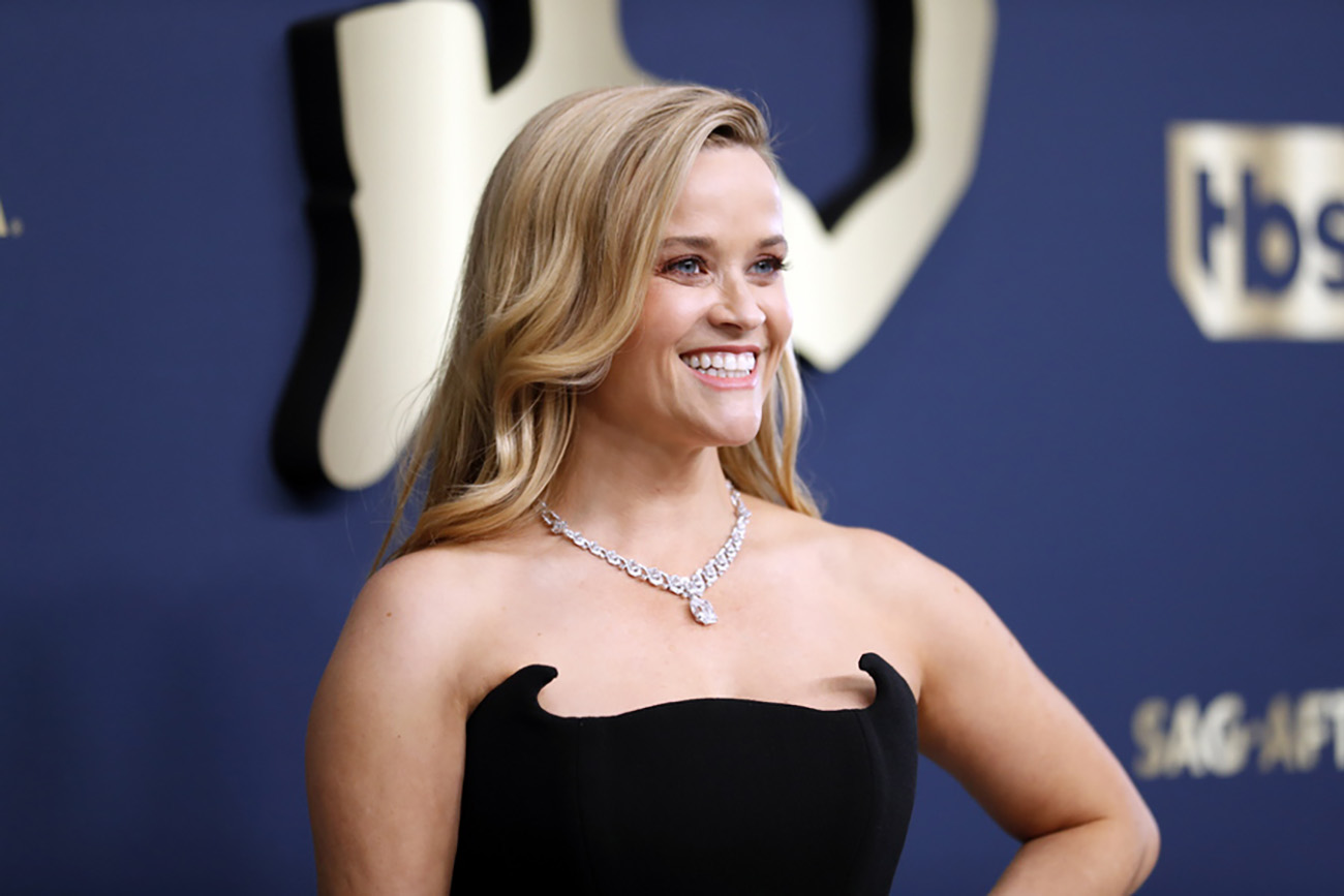 epa09790555 Reese Witherspoon poses on the red carpet during the 28th Screen Actors Guild Awards at the at the Barker Hangar in Santa Monica, California, USA, 27 February 2022.  EPA