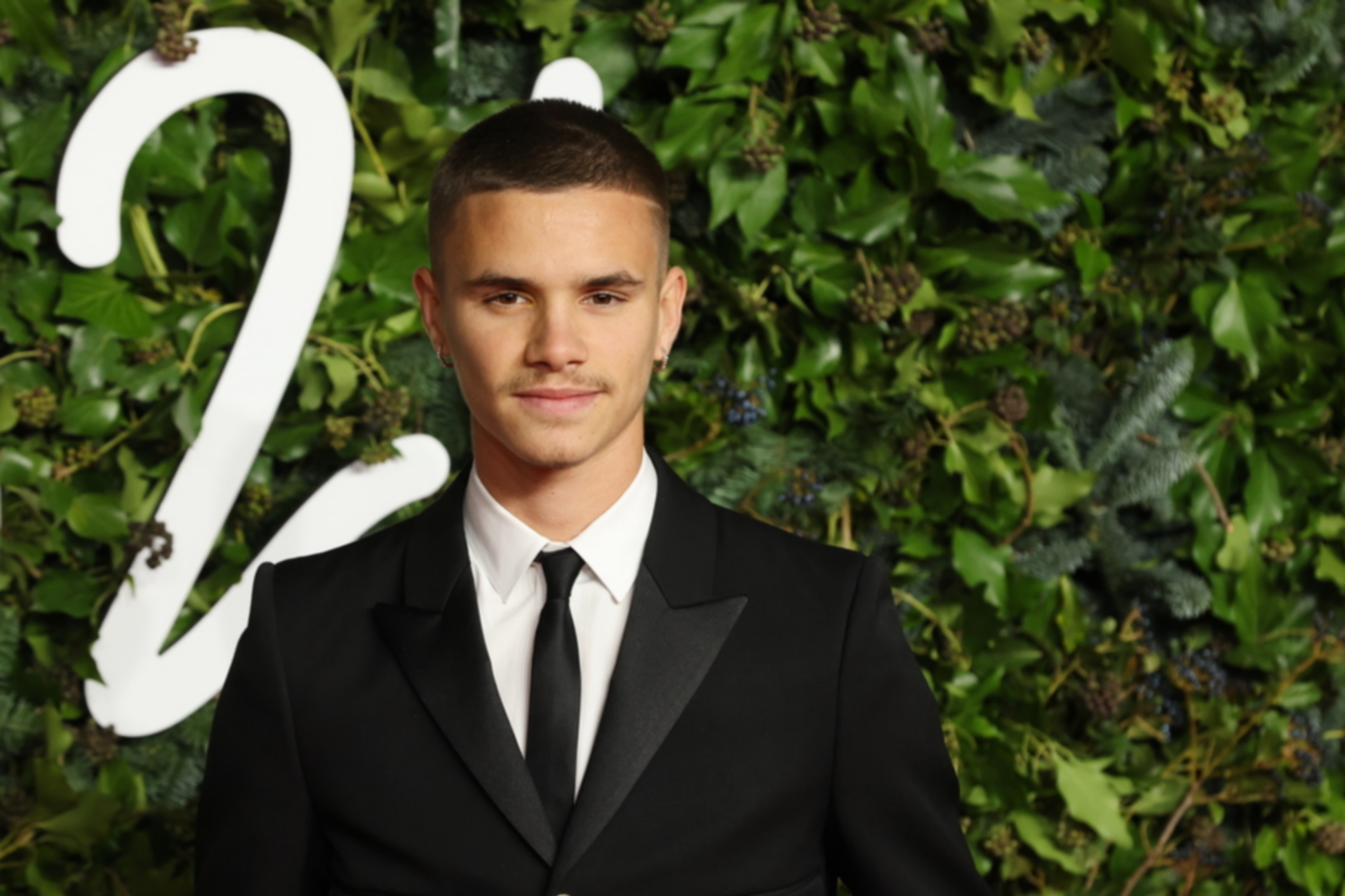 epa09611816 Footballer Romeo Beckham arrives for the Fashion Awards 2021 at the Royal Albert Hall in London, Britain, 29 November 2021  EPA