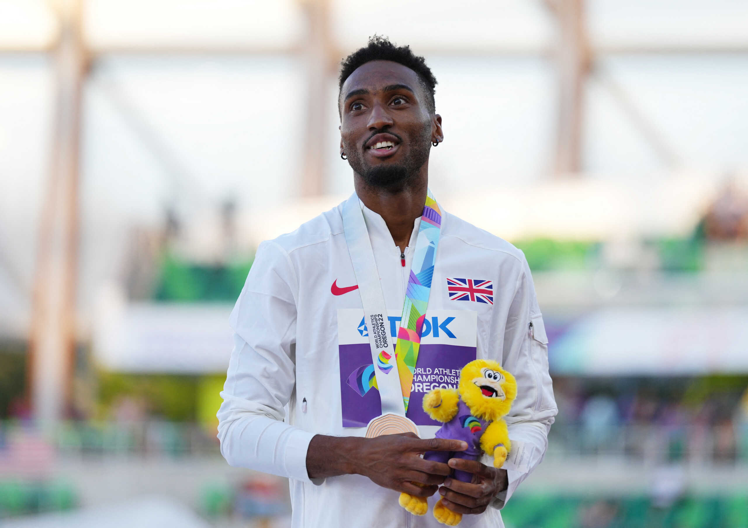 Athletics - World Athletics Championships - Men's 400 Metres - Final - Hayward Field, Eugene, Oregon, U.S. - July 22, 2022  Bronze medallist Britain's Matthew Hudson-Smith celebrates on the podium during the medal ceremony after the men's 400 metres final REUTERS
