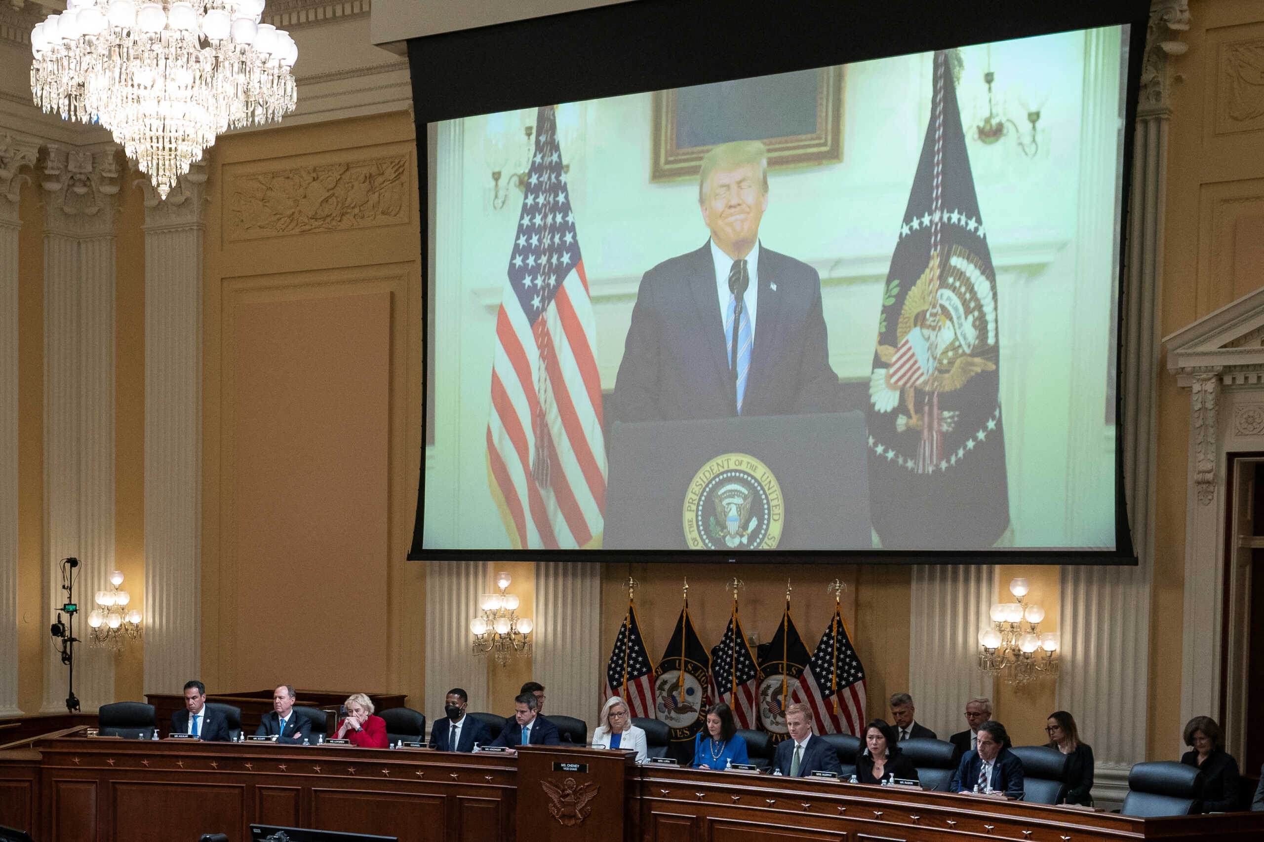 A video of President Donald Trump is shown on a screen, as the House select committee investigating the Jan. 6 attack on the U.S. Capitol holds a hearing at the Capitol in Washington, Thursday, July 21, 2022. Alex Brandon