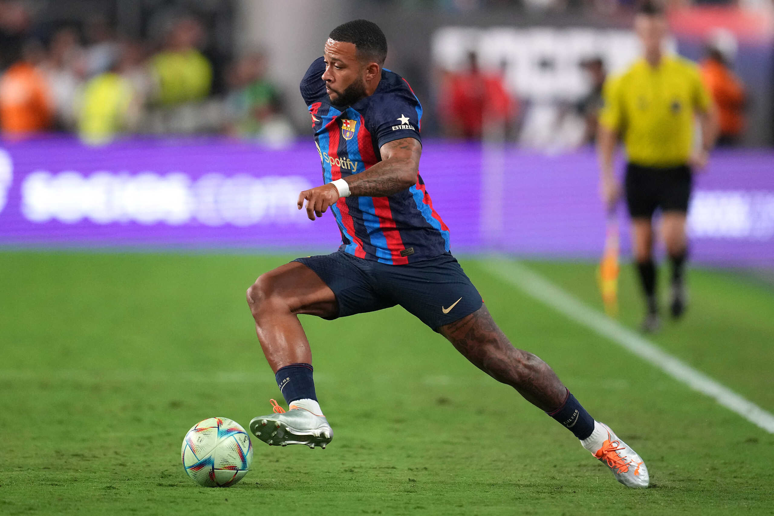 Jul 23, 2022; Las Vegas, Nevada, USA; Barcelona midfielder Memphis Depay (9) controls the ball during a game against Real Madrid at Allegiant Stadium. Mandatory Credit: Stephen R. Sylvanie-USA TODAY Sports