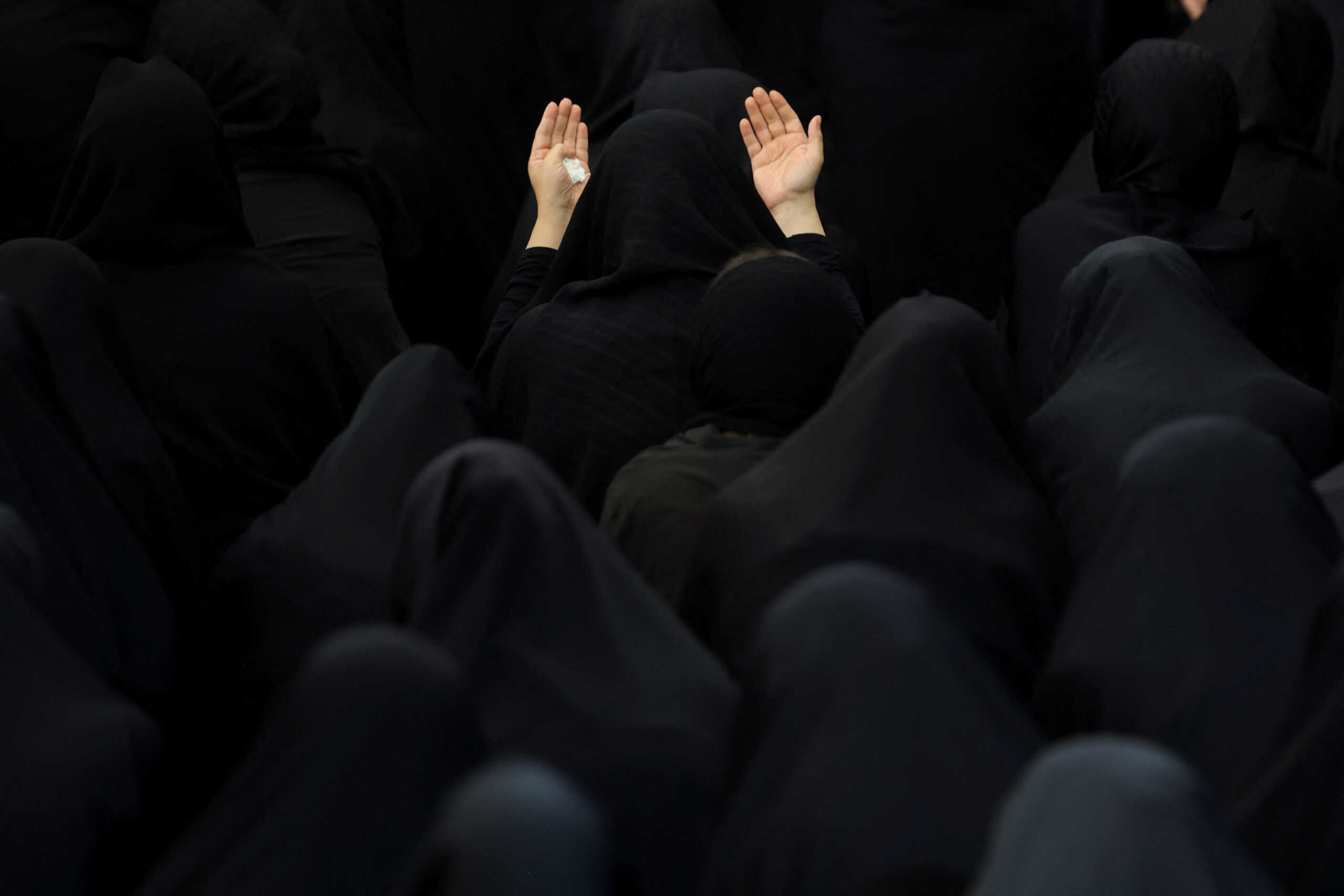 Iranian Shi'ite Muslim women take part in a mourning ritual ahead of Ashura, the holiest day on the Shi'ite Muslim calendar in Tehran, Iran August 7, 2022. Majid Asgaripour