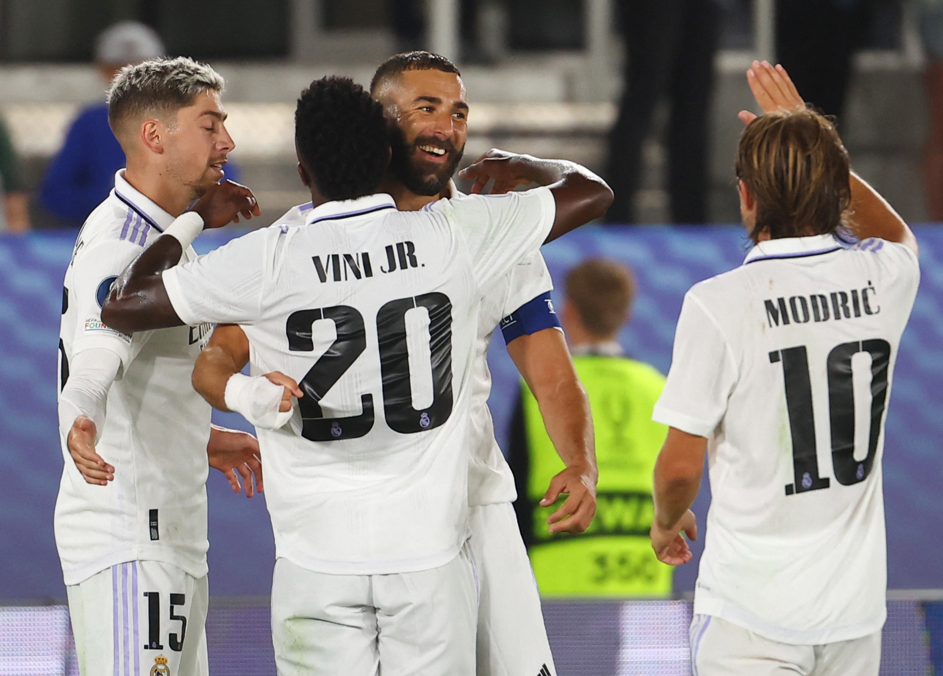 Soccer Football - European Super Cup - Real Madrid v Eintracht Frankfurt - Helsinki Olympic Stadium, Helsinki, Finland - August 10, 2022 Real Madrid's Karim Benzema celebrates scoring their second goal with Federico Valverde, Vinicius Junior and Luka Modric REUTERS