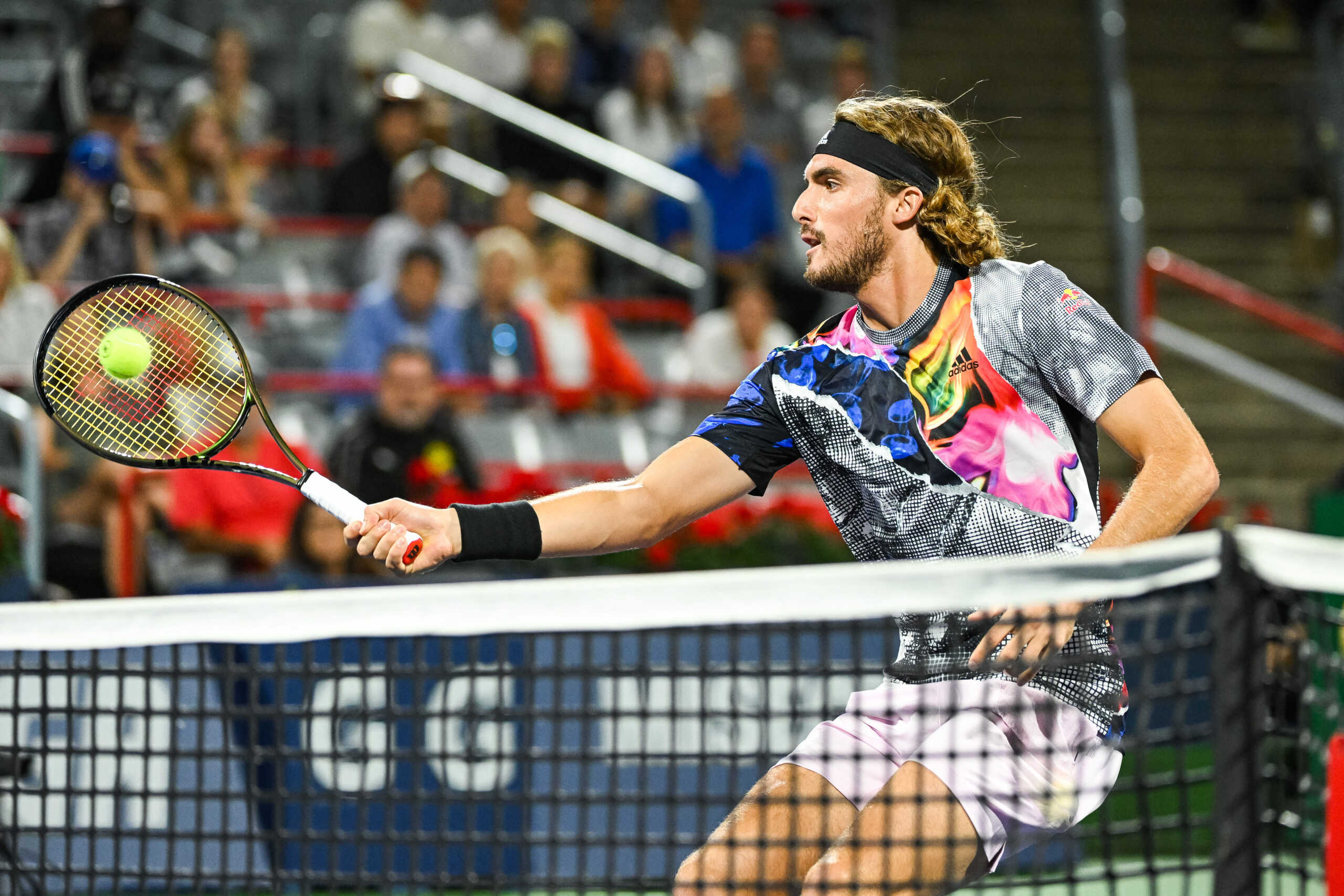 Aug 10, 2022; Montreal, Quebec, Canada; Stefanos Tsitsipas (GRE) hits a shot against Jack Draper (GBR) (not pictured) during second round play at IGA Stadium. Mandatory Credit: David Kirouac-USA TODAY Sports