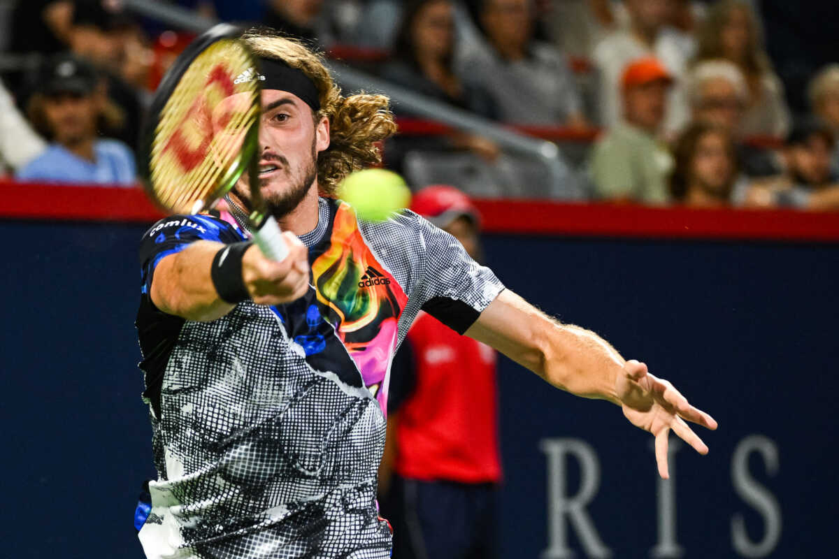 Aug 10, 2022; Montreal, Quebec, Canada; Stefanos Tsitsipas (GRE) hits a shot against Jack Draper (GBR) (not pictured)  during second round play at IGA Stadium. Mandatory Credit: David Kirouac-USA TODAY Sports