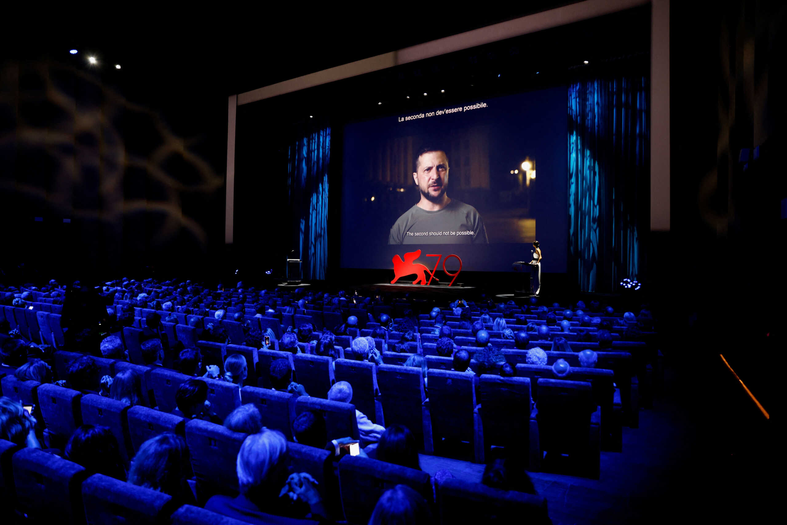 The 79th Venice Film Festival - Opening Ceremony - Venice, Italy, August 31, 2022 - Ukraine's President Volodymyr Zelenskiy addresses the audience. REUTERS
