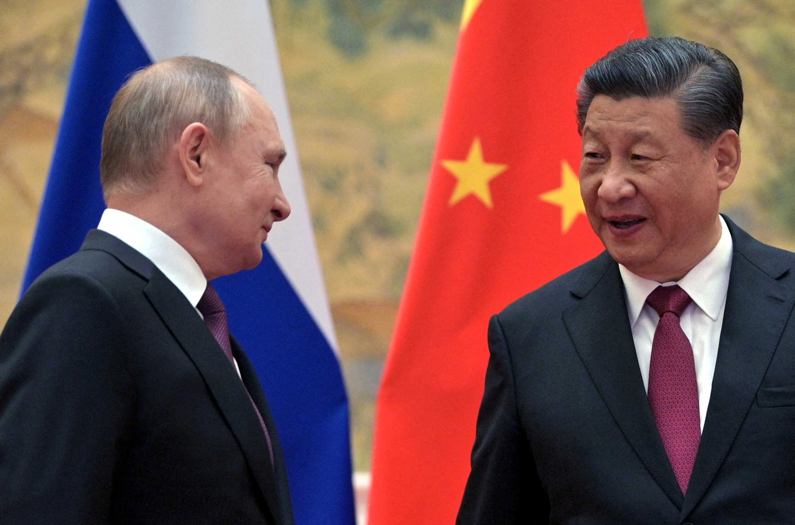 FILE PHOTO: Russian President Vladimir Putin attends a meeting with Chinese President Xi Jinping in Beijing, China February 4, 2022. Sputnik