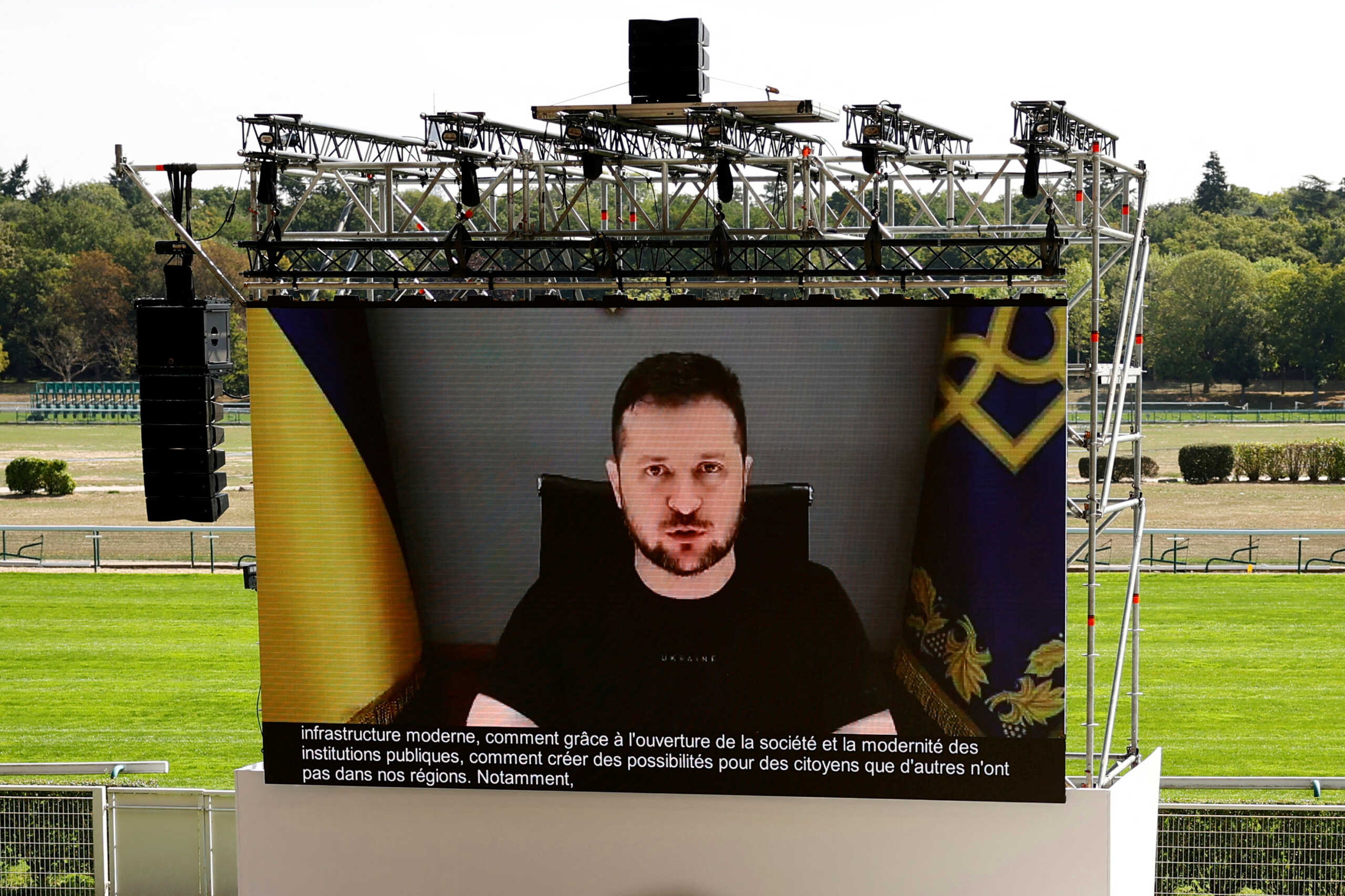 Ukraine's President Volodymyr Zelenskiy speaks via video conference during the MEDEF union summer forum "La Rencontre des Entrepreneurs de France, LaREF" at the Paris Longchamp Racecourse in Paris, France, August 29, 2022.  REUTERS