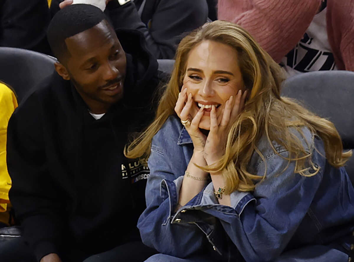 epa09962038 British singer-songwriter Adele (R) and her boyfriend Rich Paul (L) react during the second half of the NBA Playoffs, Western Conference Finals, game two between the Golden State Warriors and the Dallas Mavericks at Chase Center in San Francisco, California, USA, 20 May 2022.  EPA