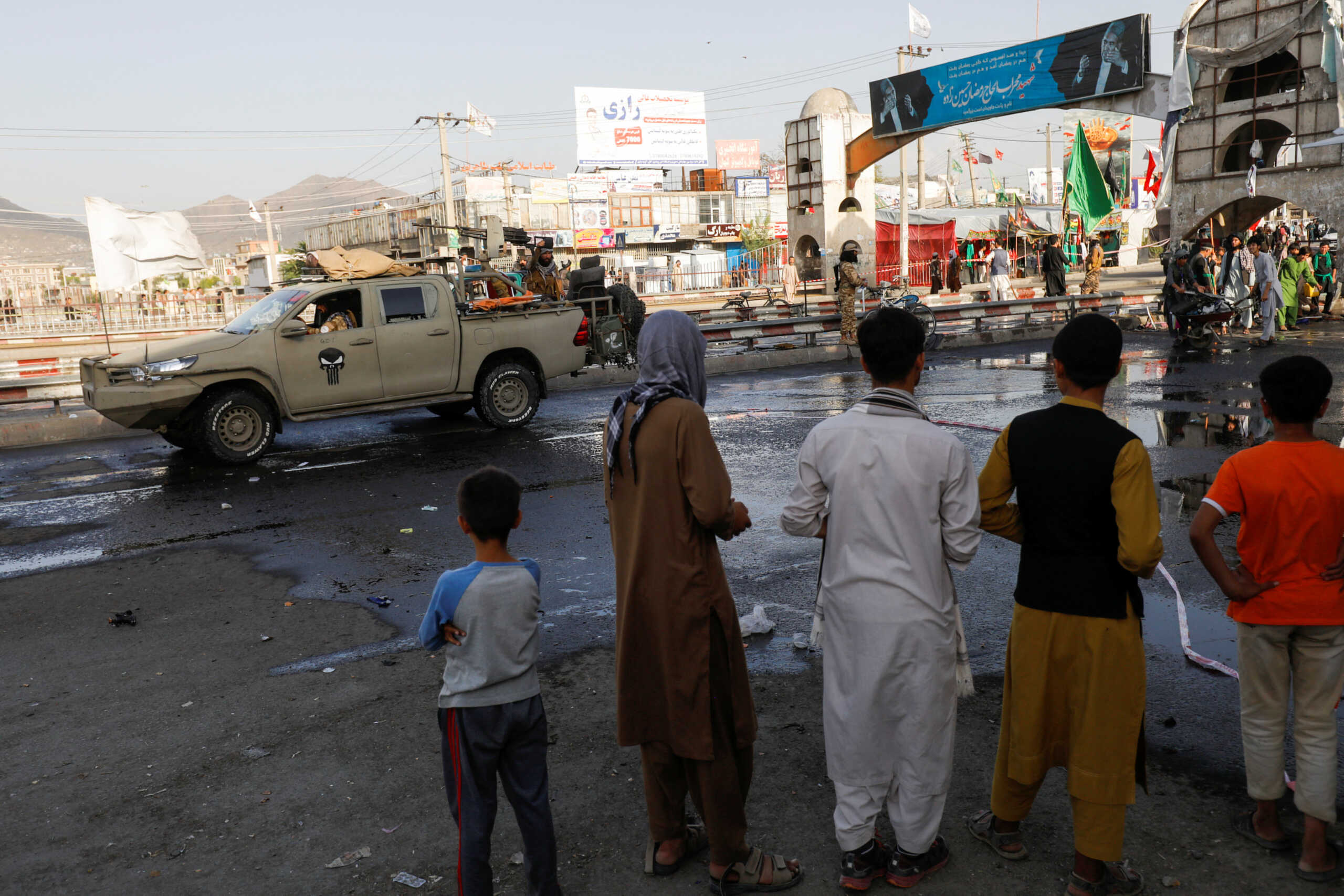 A Taliban car is seen guarding at the site of a blast in Kabul, Afghanistan, August 6, 2022. REUTERS