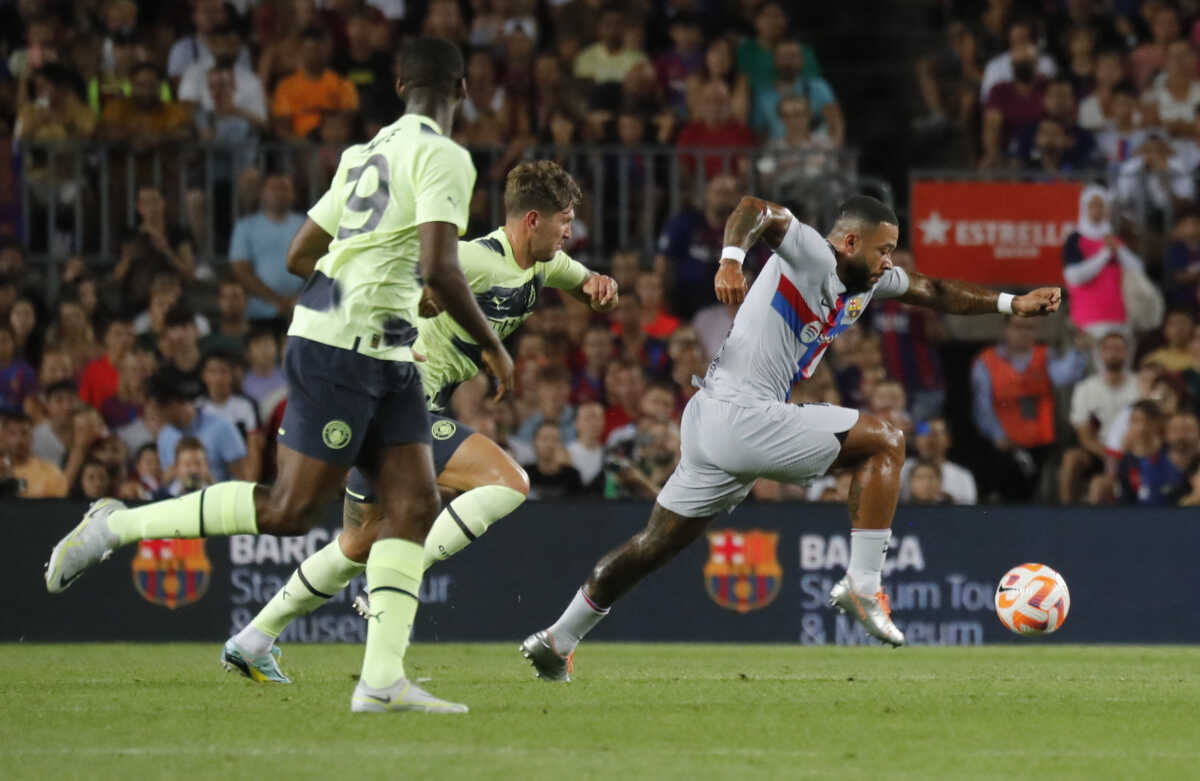 Soccer Football - Friendly - FC Barcelona v Manchester City - Camp Nou, Barcelona, Spain - August 24, 2022 FC Barcelona's Memphis Depay in action REUTERS