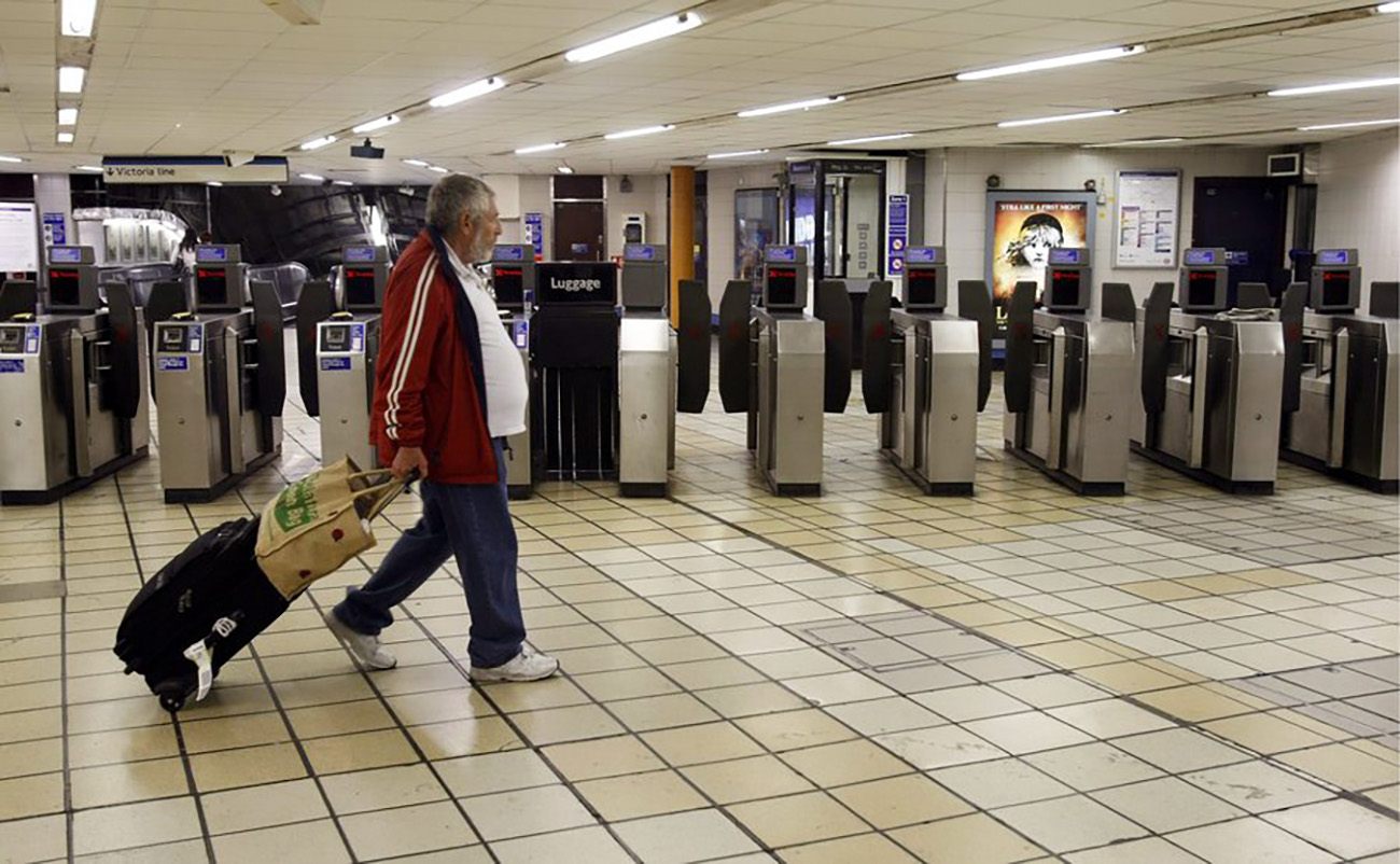 epa02373251 (FILE) A file photo dated 09 June 2009 of a passenger walking along an unusual empty Victoria Underground Station after London's tube network disrupts its service for a 48 hour strike, in London, Britain. Public transport in London was severely disrupted 04 October 2010 due to a 24-hour strike by drivers and other staff on the Tube, London‘s underground commuter system. Transport for London said most Tube lines were suspended and a quarter of all stations closed. Commuters used cars, buses, taxis, river boats and bicycles to beat the strike. The two unions involved, the RMT and the TSSA, said the protest is against planned cuts of 800 staff, mainly at ticket offices and on station platforms.  EPA