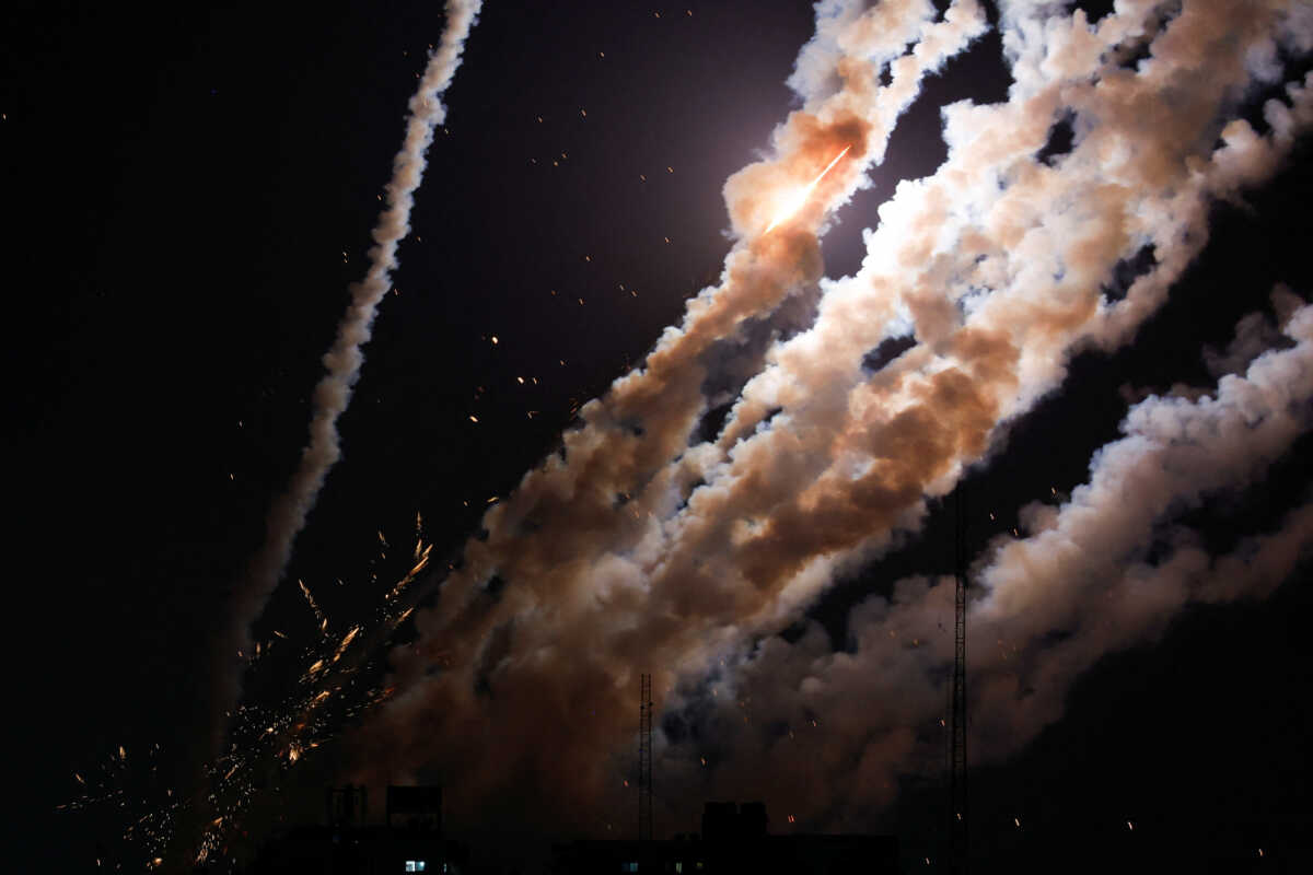 Rockets are fired by Palestinian militants into Israel, amid Israel-Gaza fighting, in Gaza August 6, 2022. REUTERS