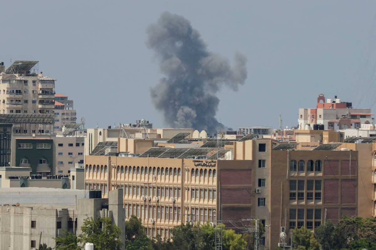 Smoke rises during an Israeli air strike, amid Israel-Gaza fighting, in Gaza City August 6, 2022. REUTERS