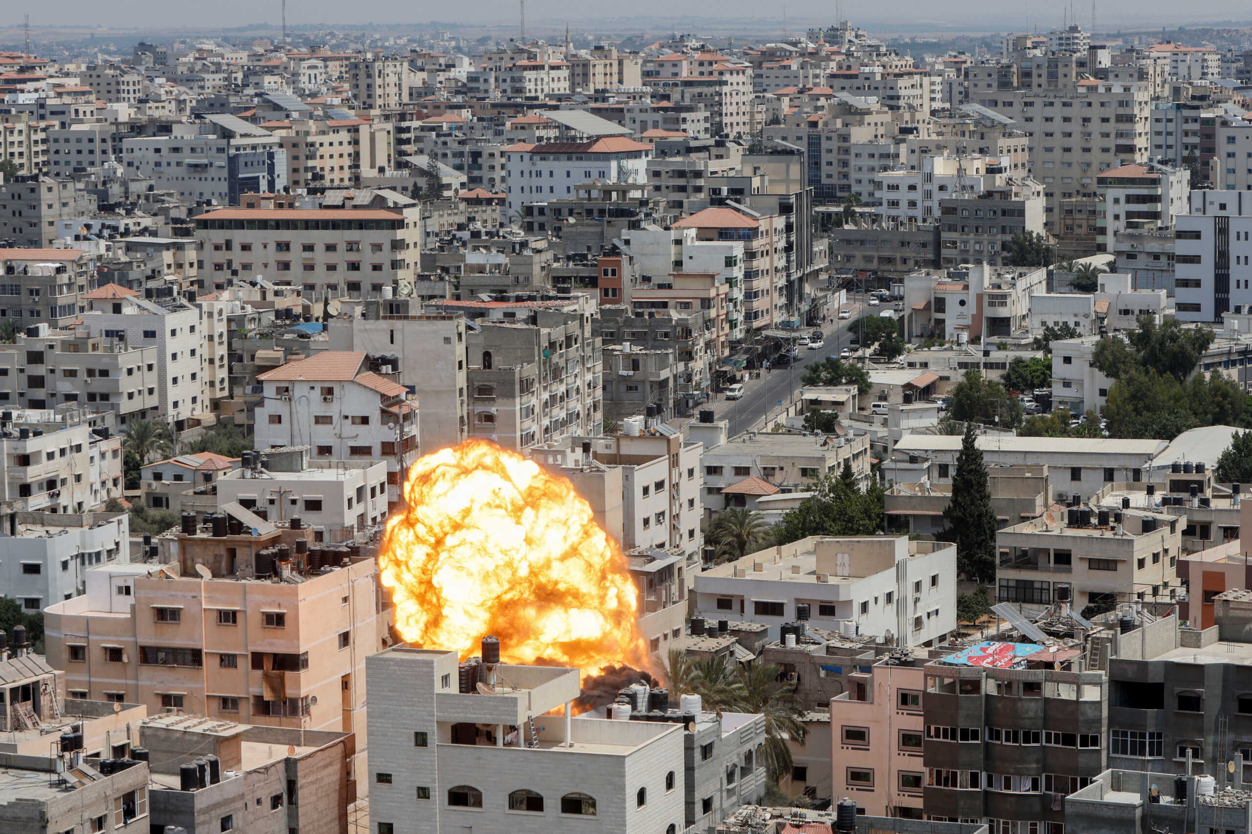 Flame rises during an Israeli air strike, amid Israel-Gaza fighting, in Gaza City August 6, 2022. REUTERS