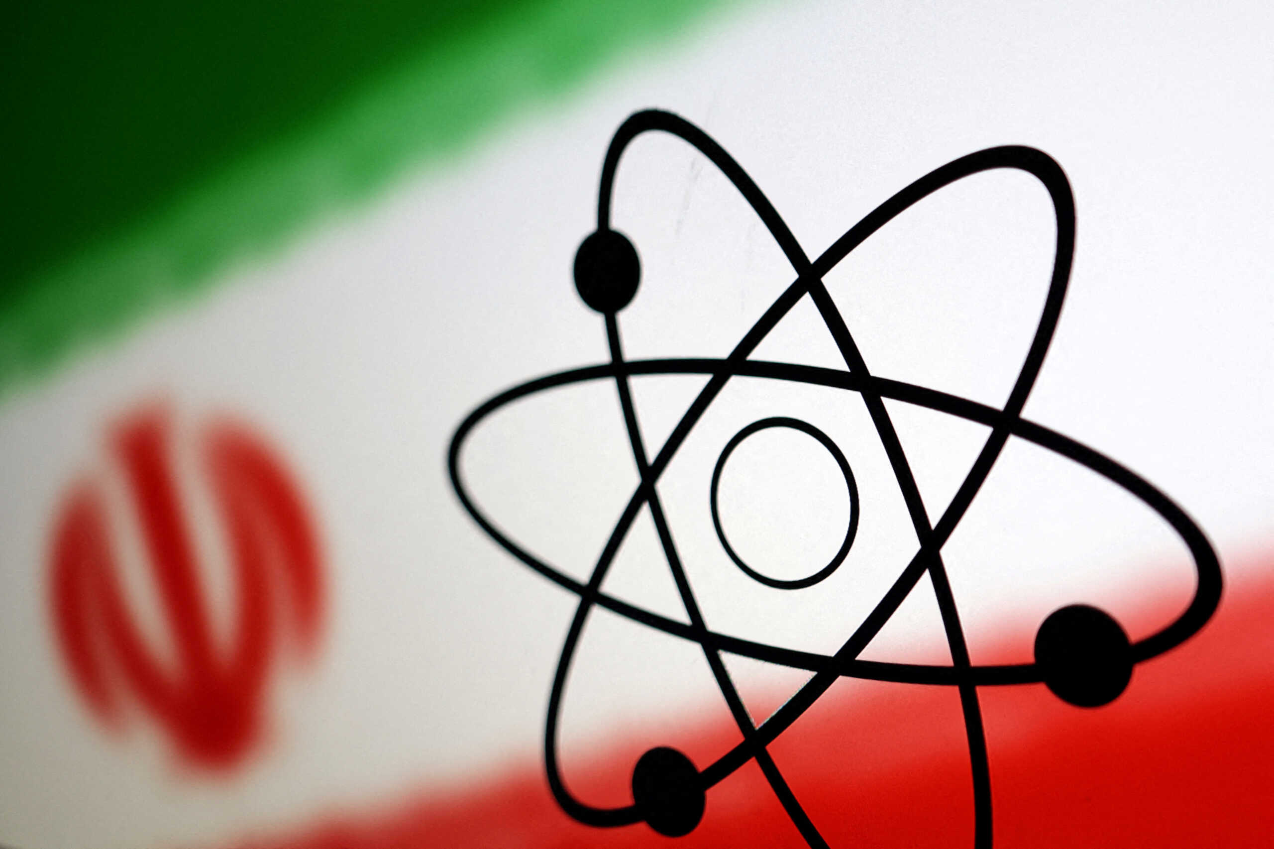 Atom symbol and Iran flag are seen in this illustration, July 21, 2022. REUTERS