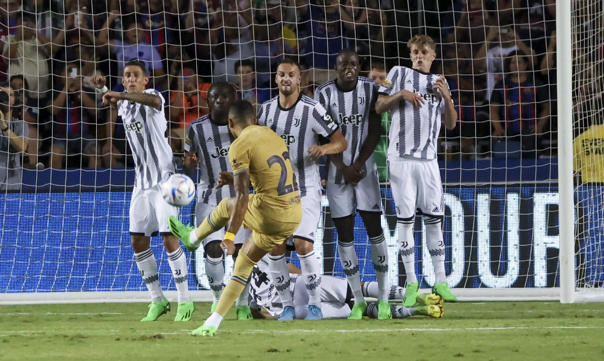 Jul 26, 2022; Dallas, Texas, USA;  FC Barcelona forward Raphinha (22) hits a free kick during the second half against Juventus at the Cotton Bowl. Mandatory Credit: Kevin Jairaj-USA TODAY Sports