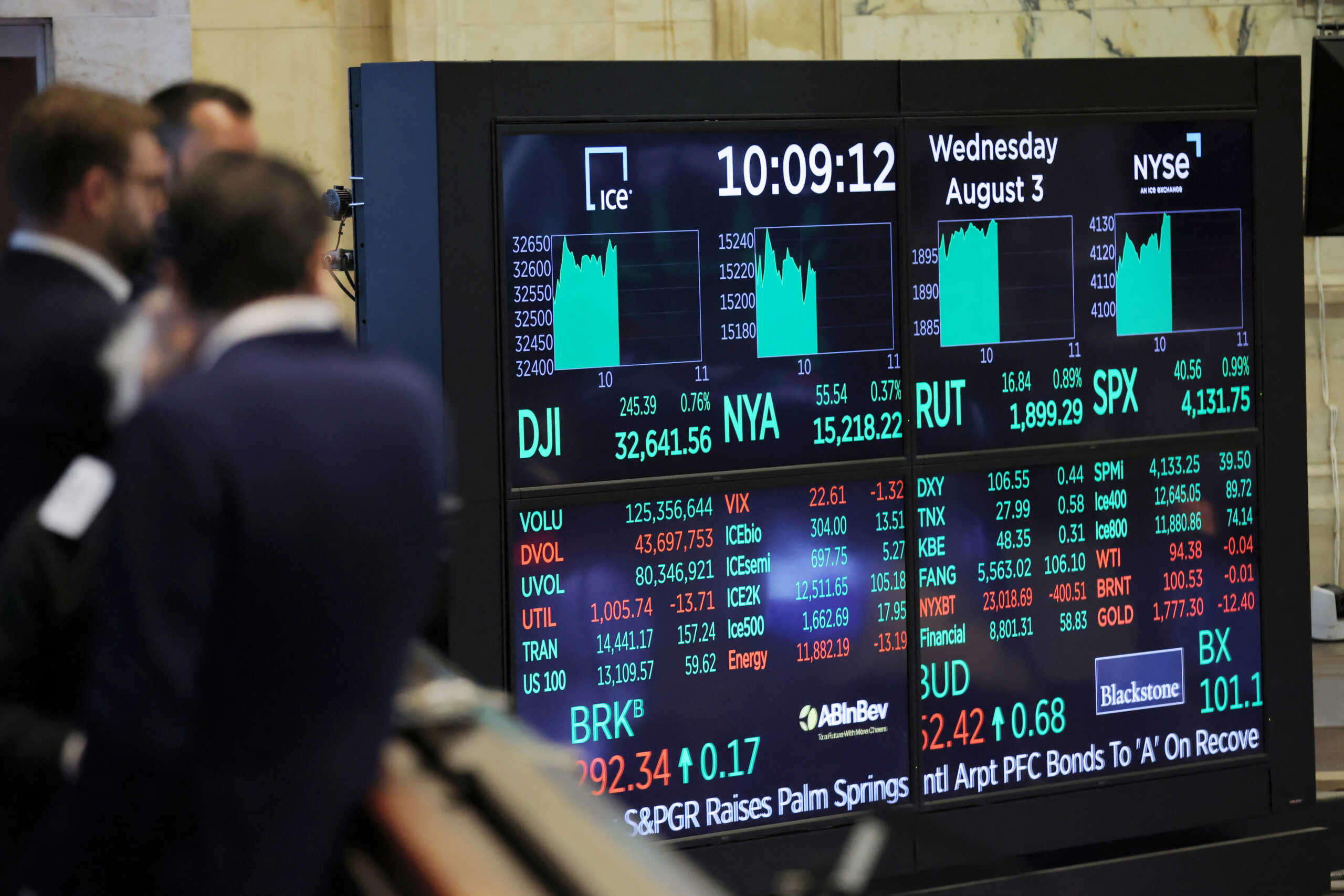 A screen displays market information on the trading floor at the New York Stock Exchange (NYSE) in Manhattan, New York City, U.S., August 3, 2022. REUTERS